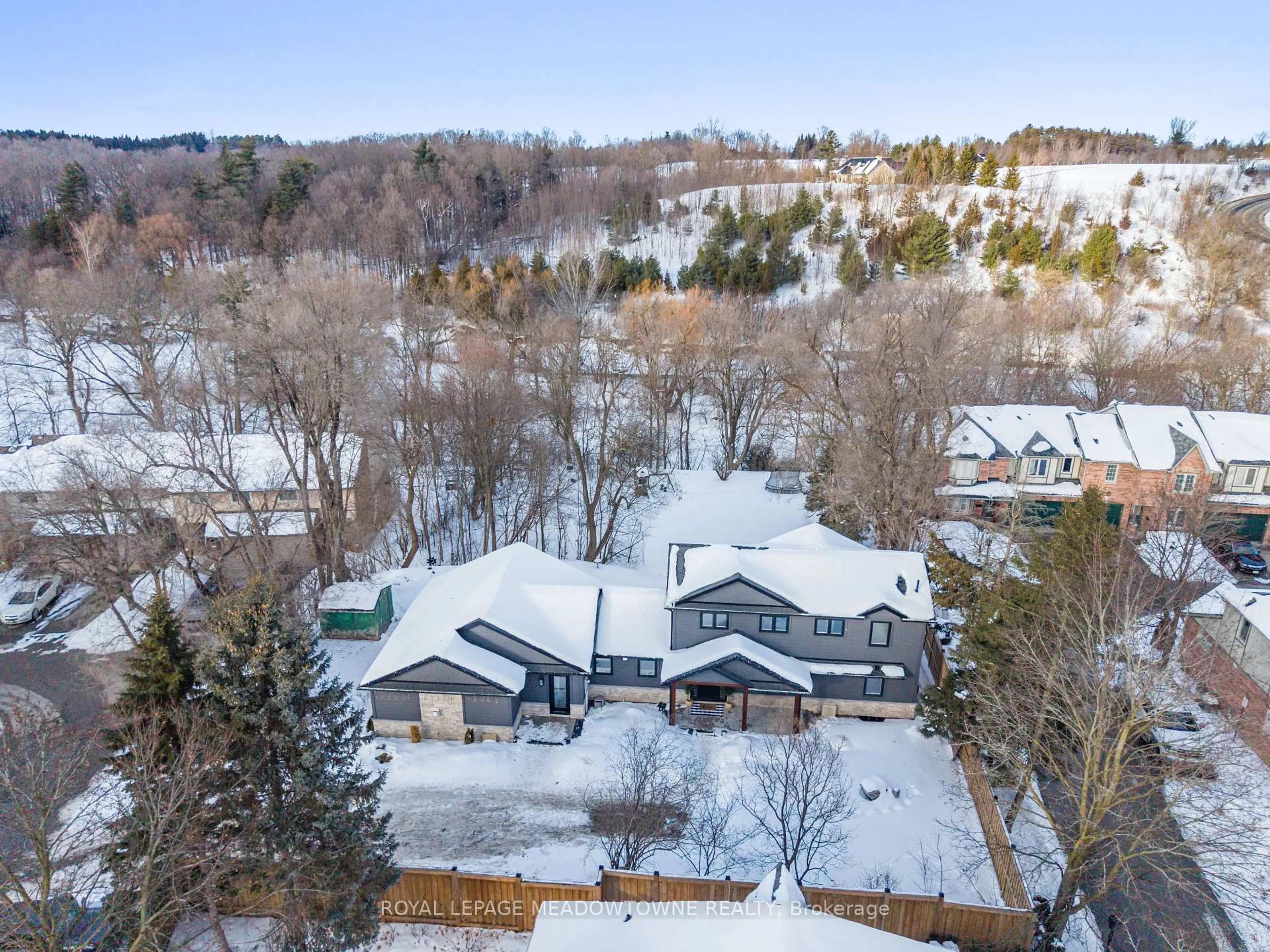 A pic from outside/outdoor area/front of a property/back of a property/a pic from drone, mountain view for 70 River Dr, Halton Hills Ontario L7G 2J2