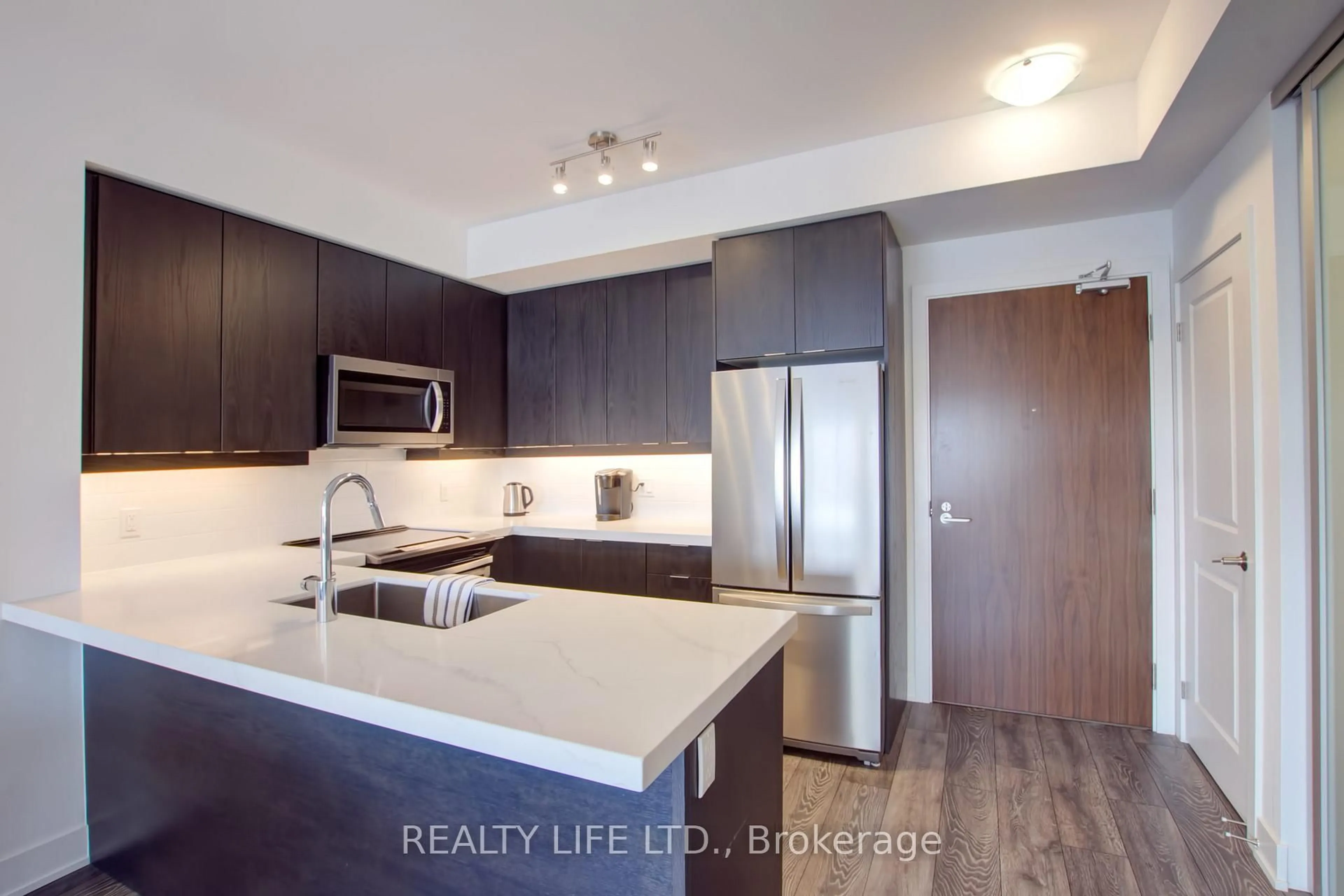 Open concept kitchen, unknown for 1050 Main St #1014, Milton Ontario L9T 9M3