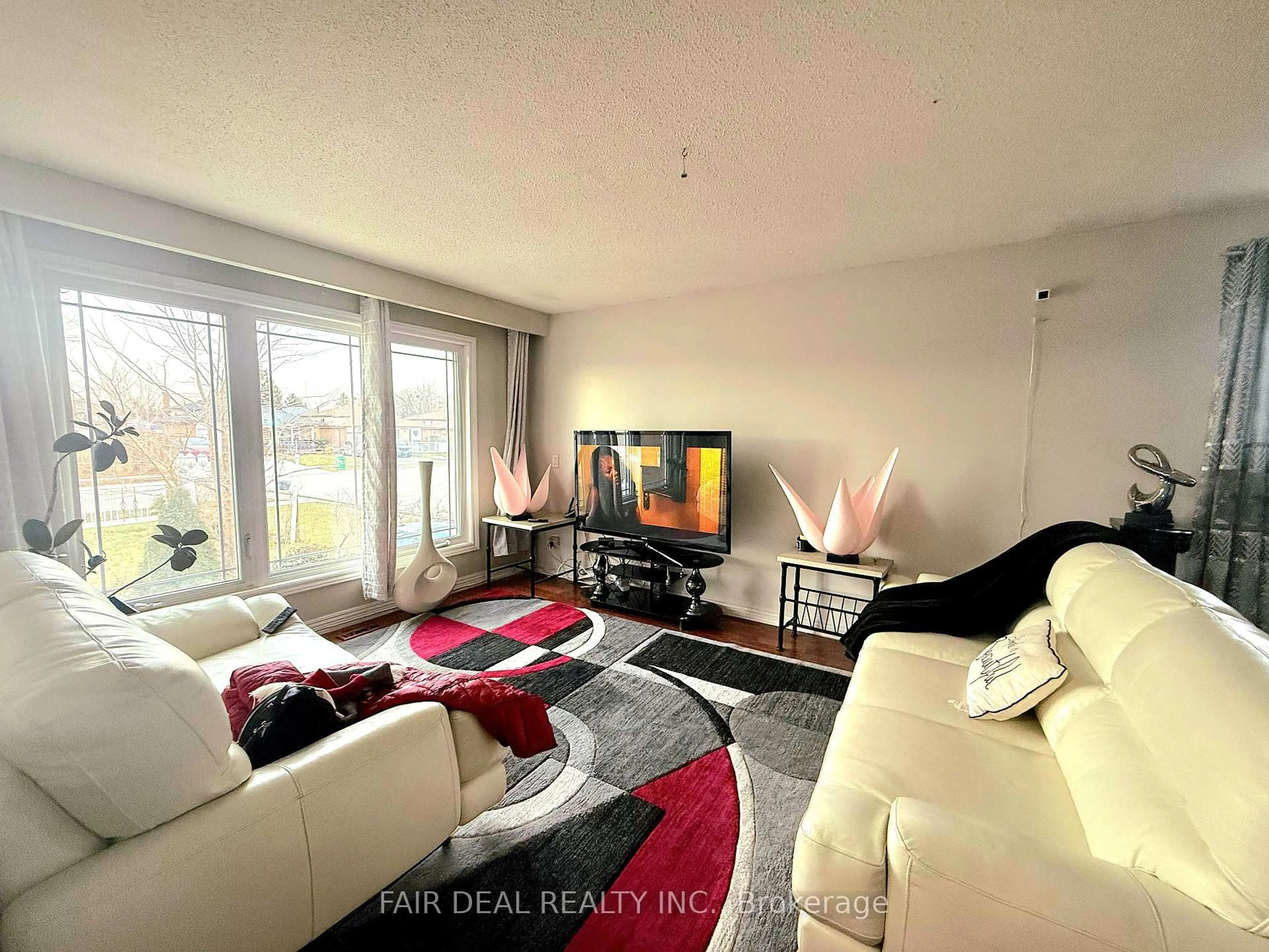 Living room with furniture, unknown for 3720 Brandon Gate Dr, Mississauga Ontario L4T 3M8