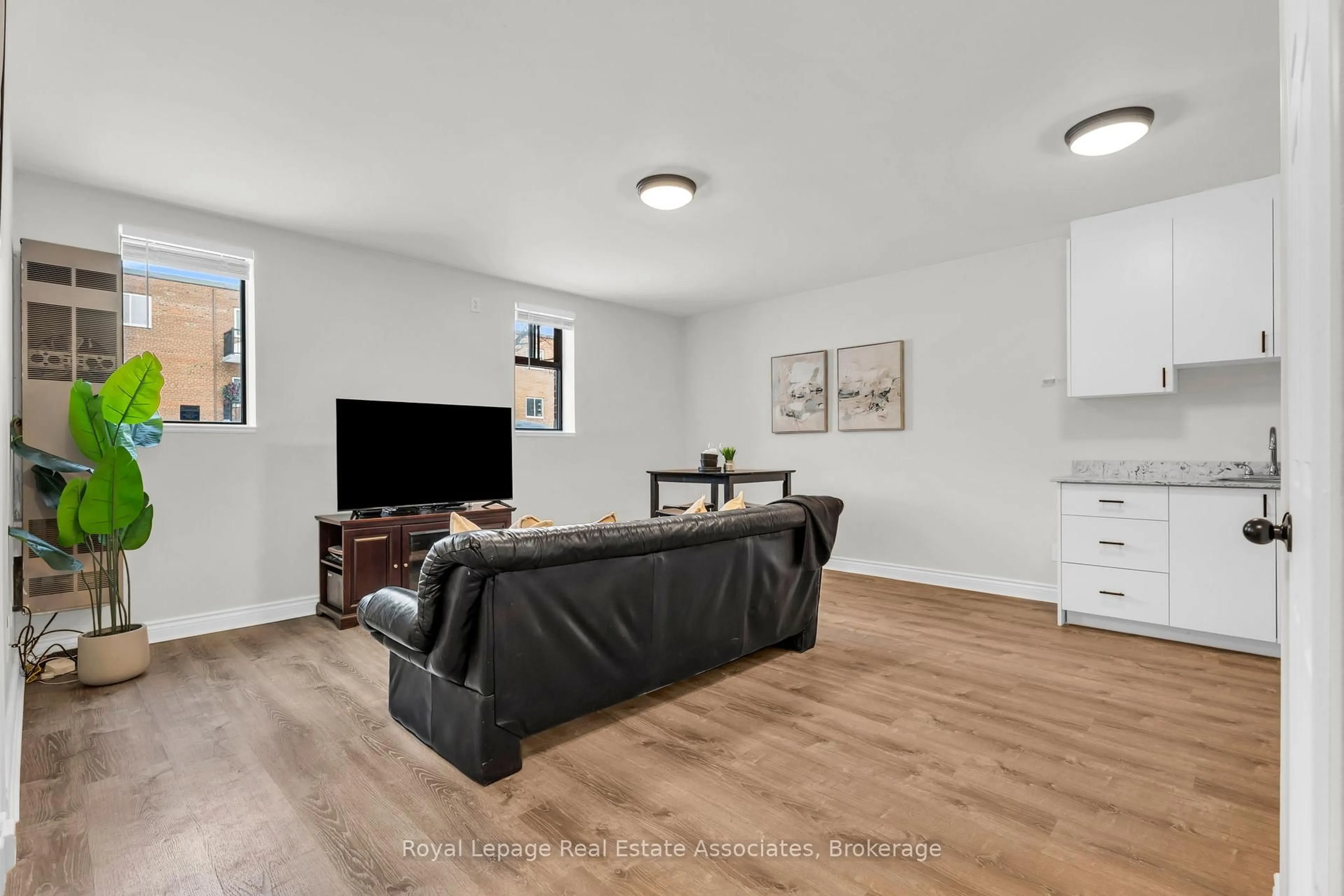 Living room with furniture, unknown for 70 First St #102, Orangeville Ontario L9W 2E5