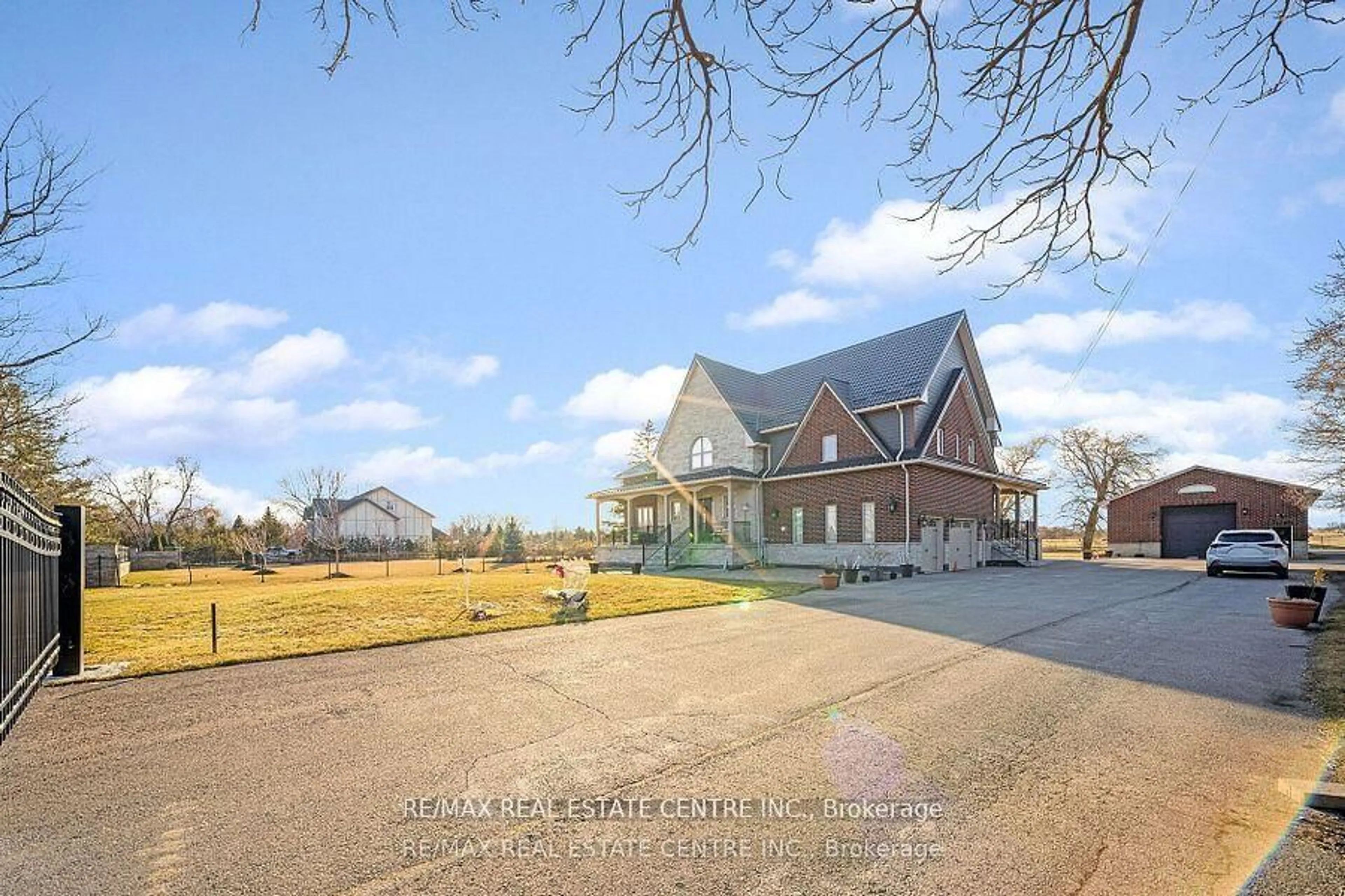 A pic from outside/outdoor area/front of a property/back of a property/a pic from drone, unknown for 14645 5 Sdrd, Halton Hills Ontario L4G 4S5