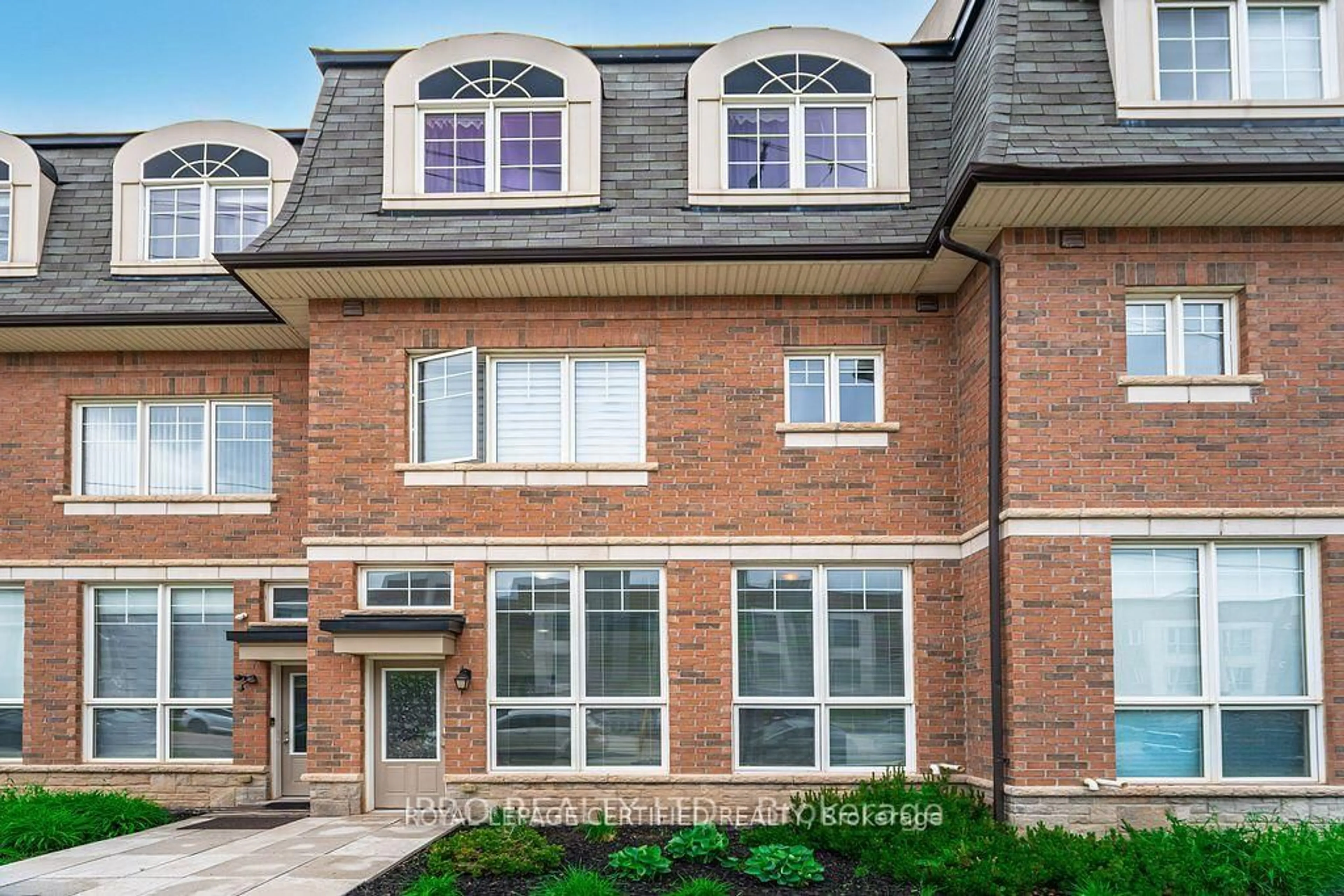Home with brick exterior material, street for 2420 Baronwood Dr #43-01, Oakville Ontario L6M 0X6