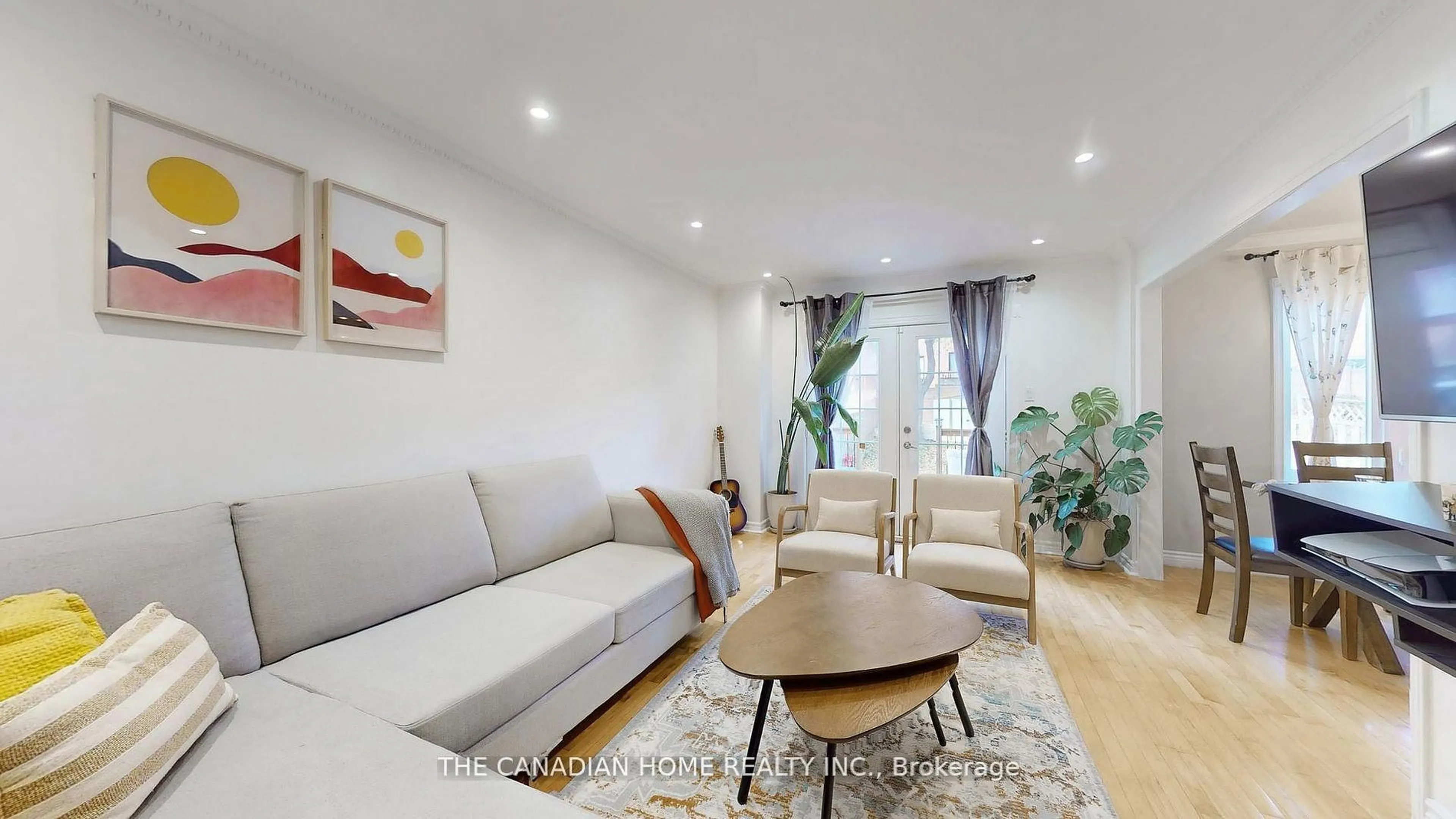 Living room with furniture, wood/laminate floor for 226 Ecclestone Dr, Brampton Ontario L6X 3P9