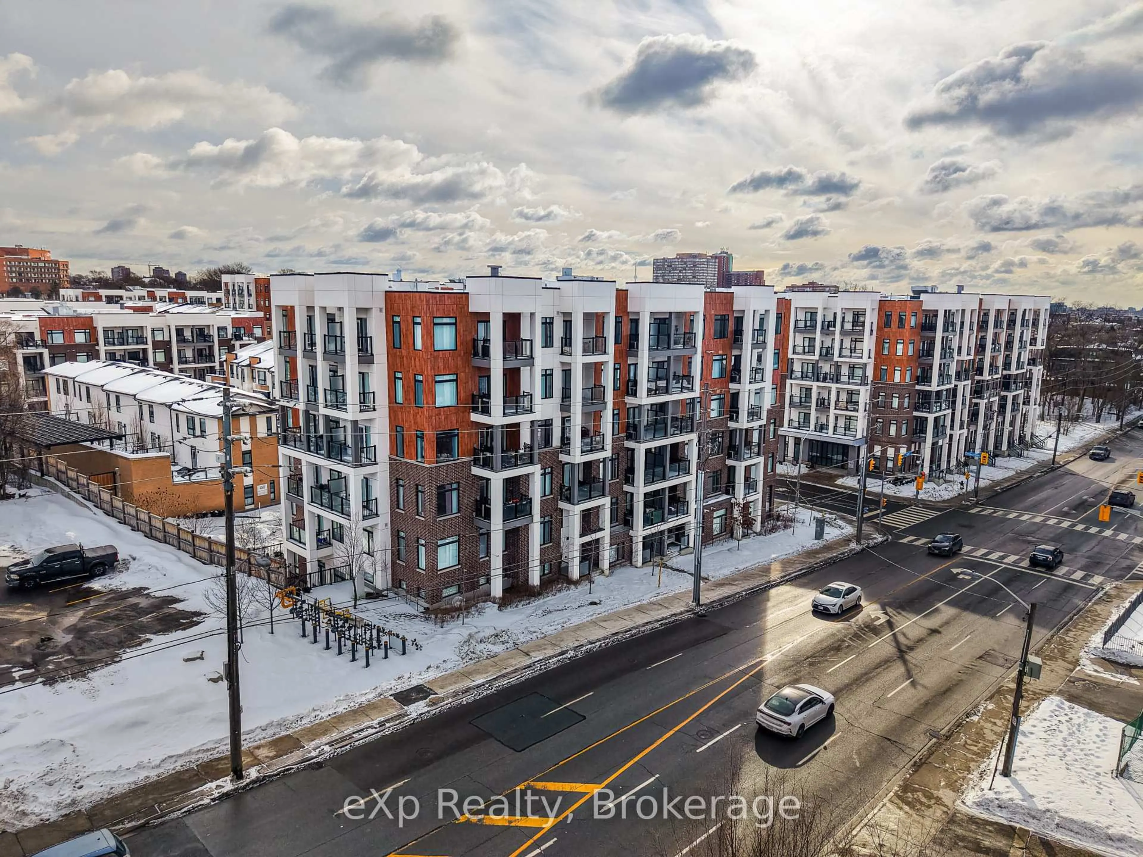 A pic from outside/outdoor area/front of a property/back of a property/a pic from drone, city buildings view from balcony for 160 Canon Jackson Dr #410, Toronto Ontario M6M 0B6