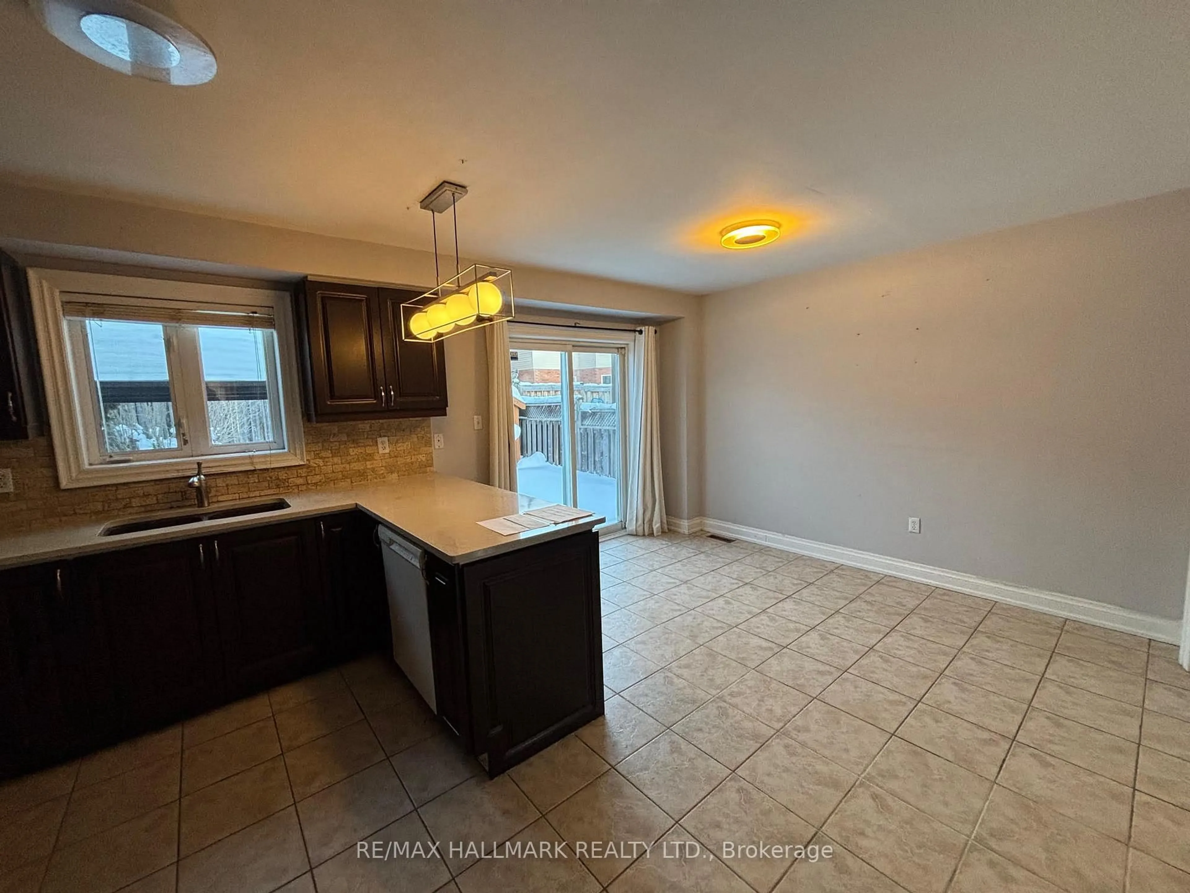 Open concept kitchen, ceramic/tile floor for 241 Featherstone Rd, Milton Ontario L9T 7C3