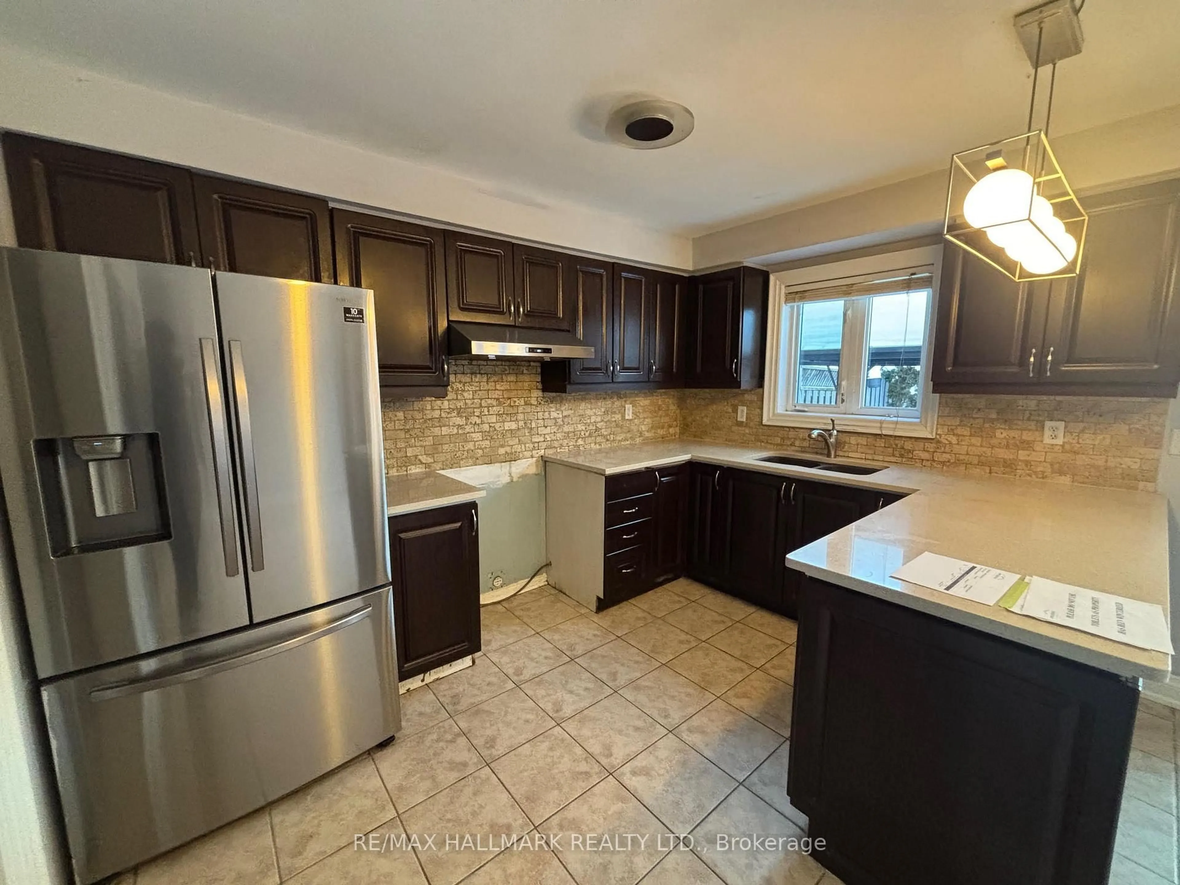 Open concept kitchen, ceramic/tile floor for 241 Featherstone Rd, Milton Ontario L9T 7C3