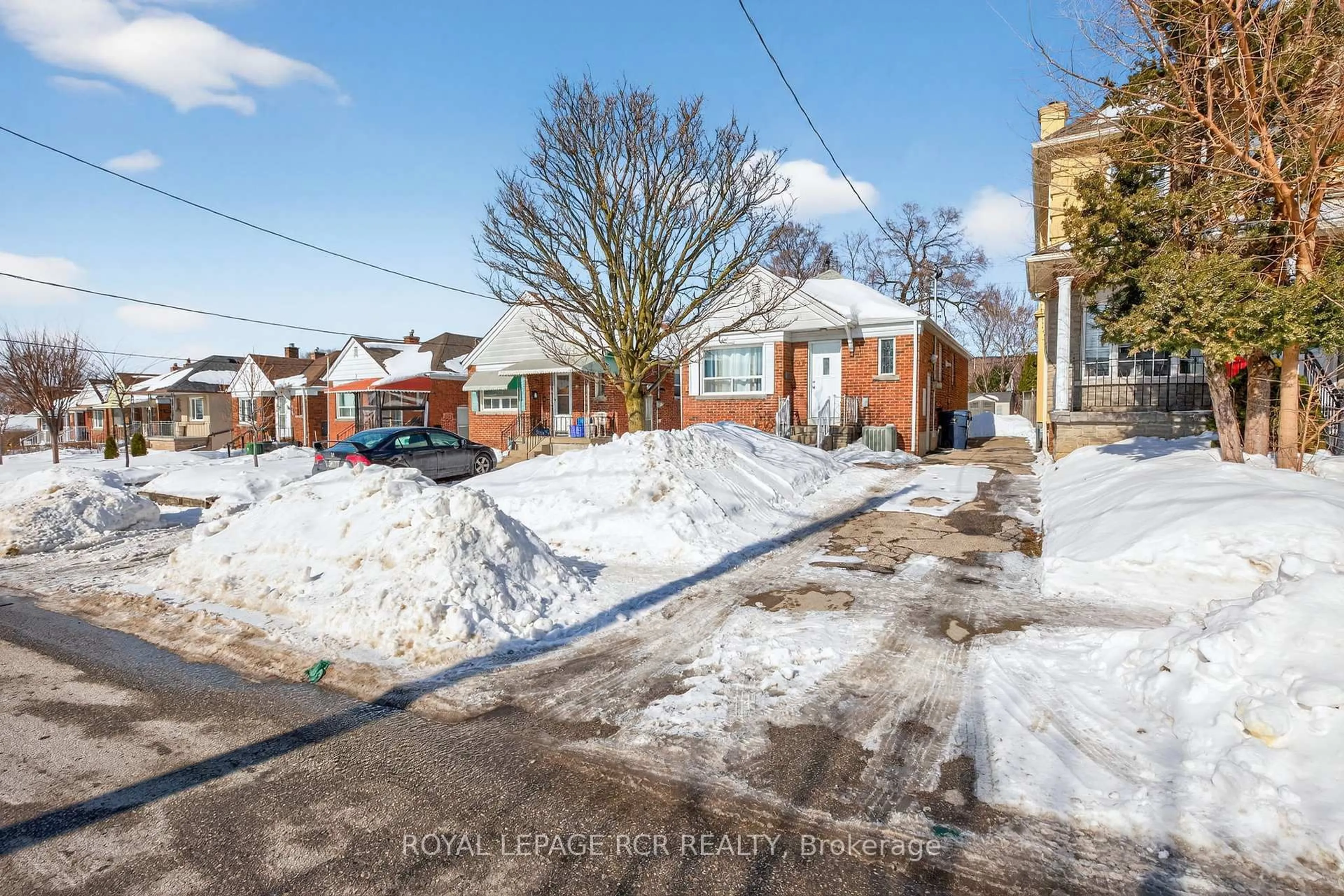 A pic from outside/outdoor area/front of a property/back of a property/a pic from drone, street for 64 Schell Ave, Toronto Ontario M6E 2S9