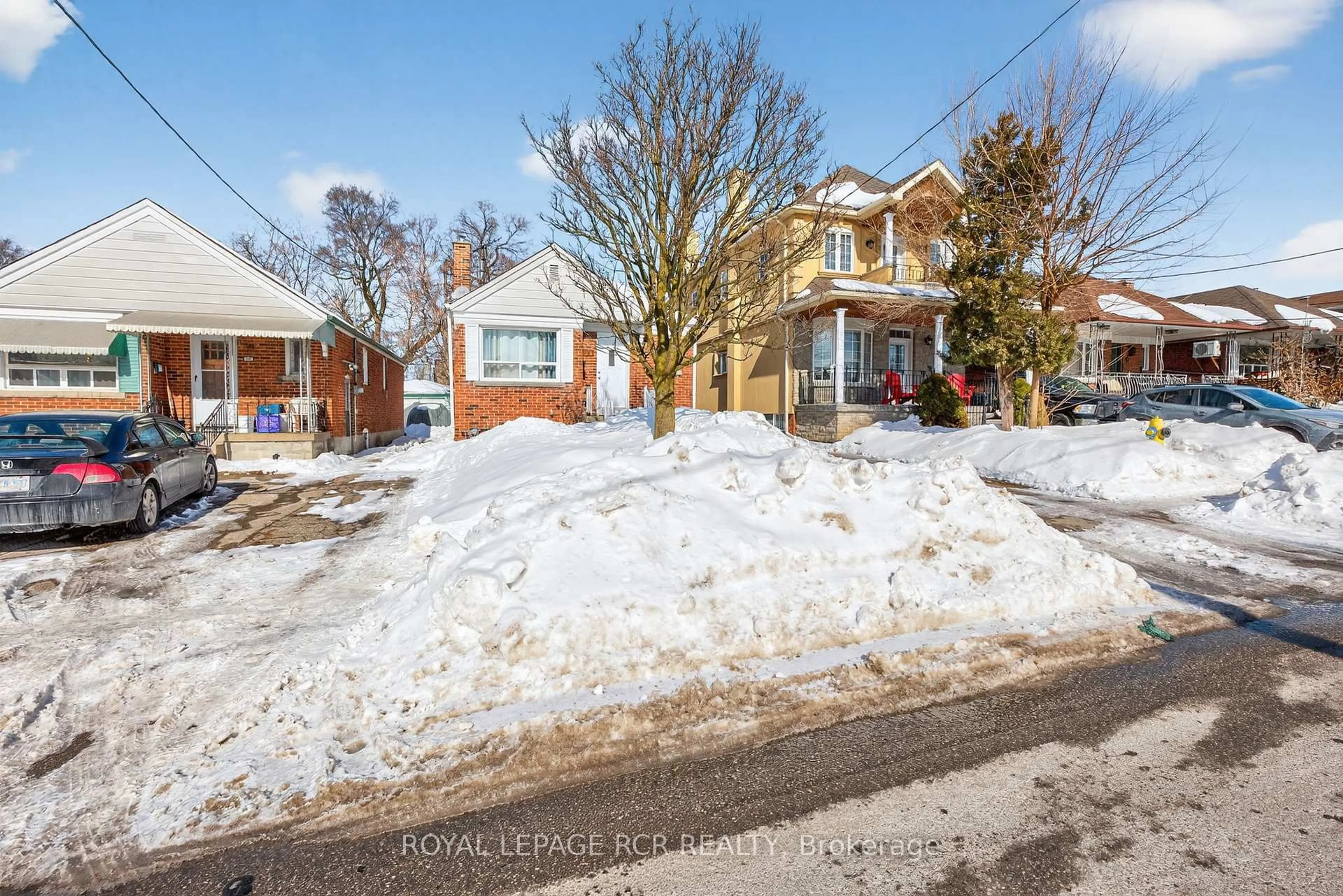 A pic from outside/outdoor area/front of a property/back of a property/a pic from drone, street for 64 Schell Ave, Toronto Ontario M6E 2S9
