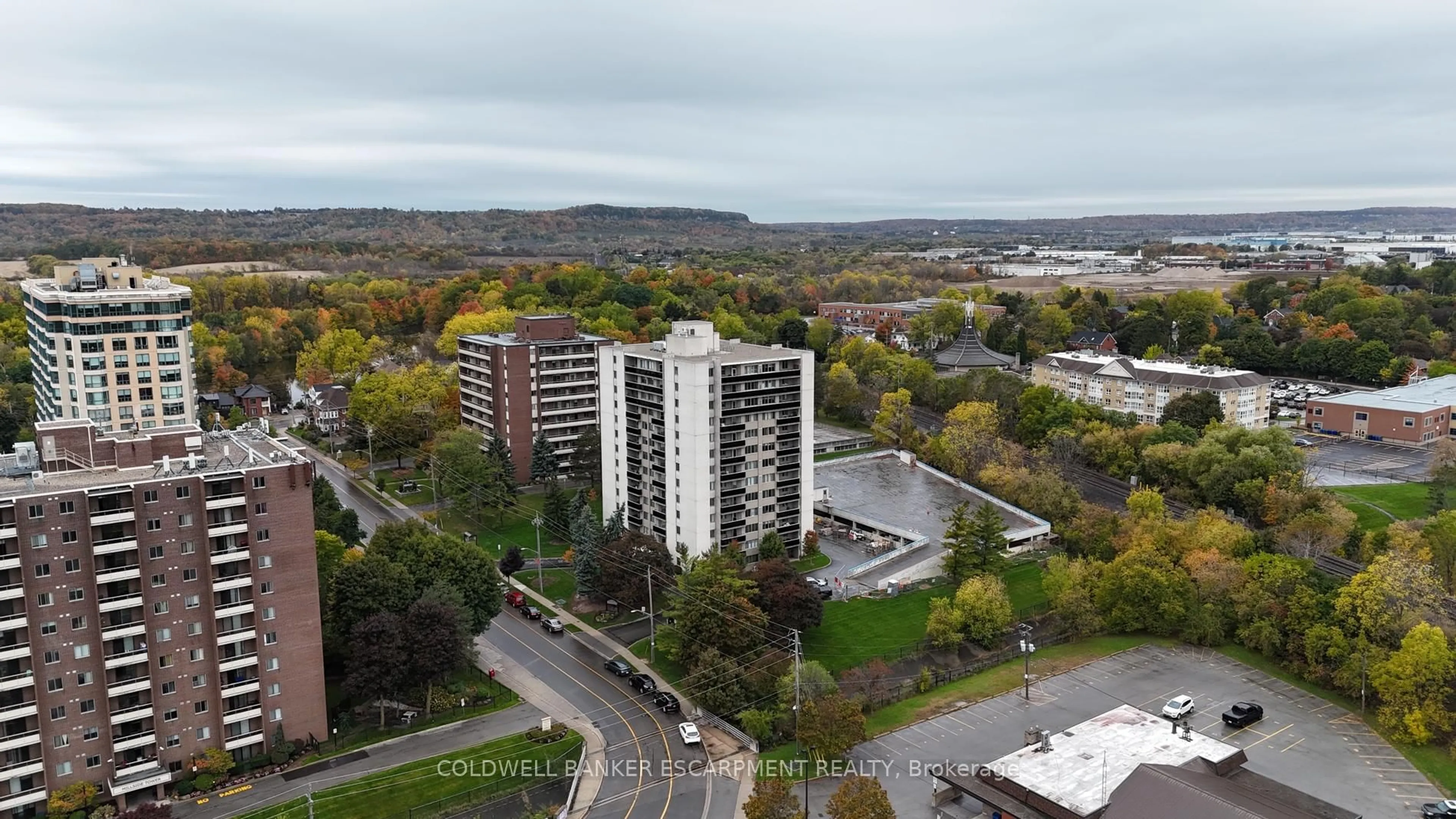 A pic from outside/outdoor area/front of a property/back of a property/a pic from drone, city buildings view from balcony for 81 Millside Dr #1005, Milton Ontario L9T 3X4