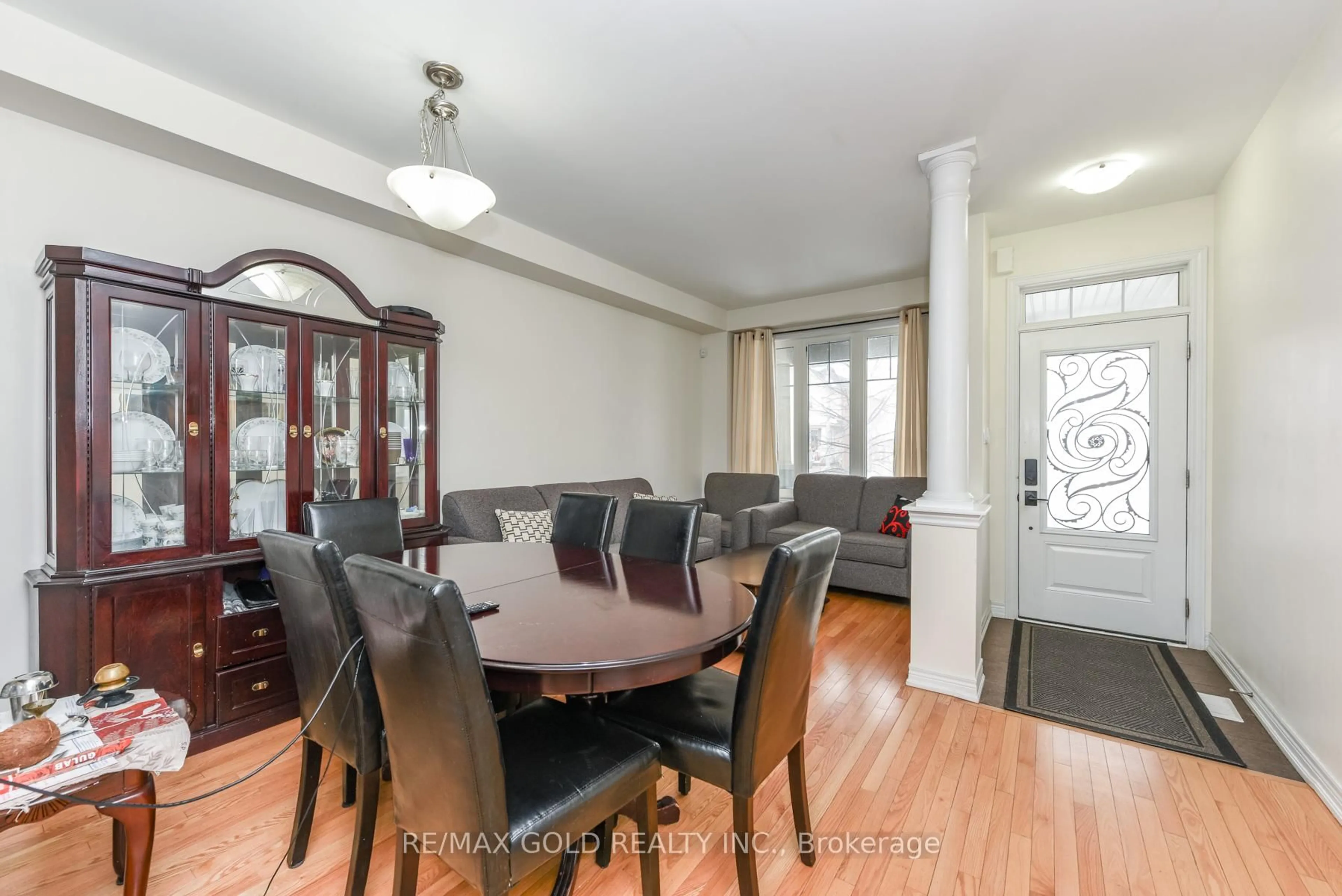 Dining room, wood/laminate floor for 22 Merrickville Way, Brampton Ontario L6Y 0V5