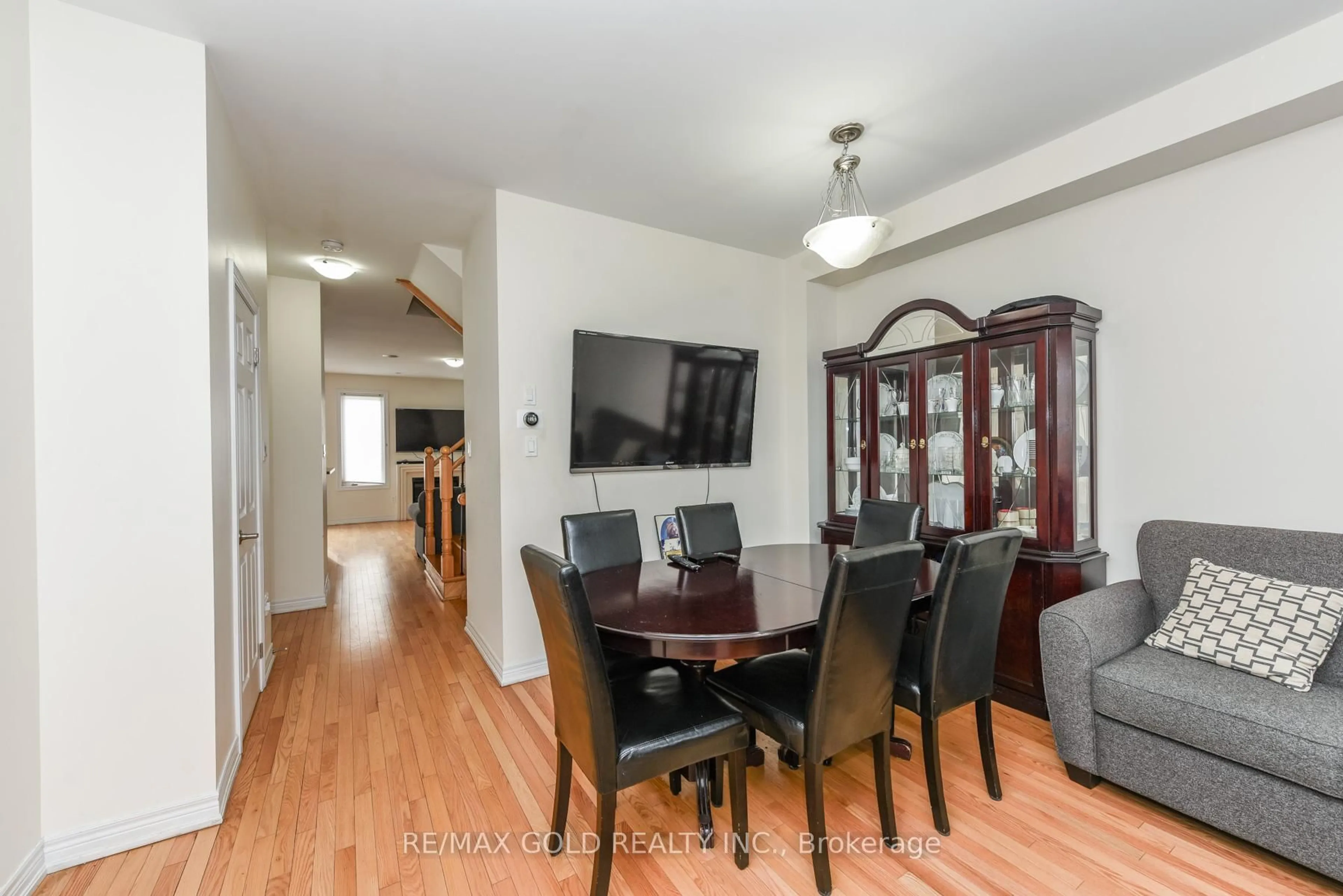 Dining room, wood/laminate floor for 22 Merrickville Way, Brampton Ontario L6Y 0V5