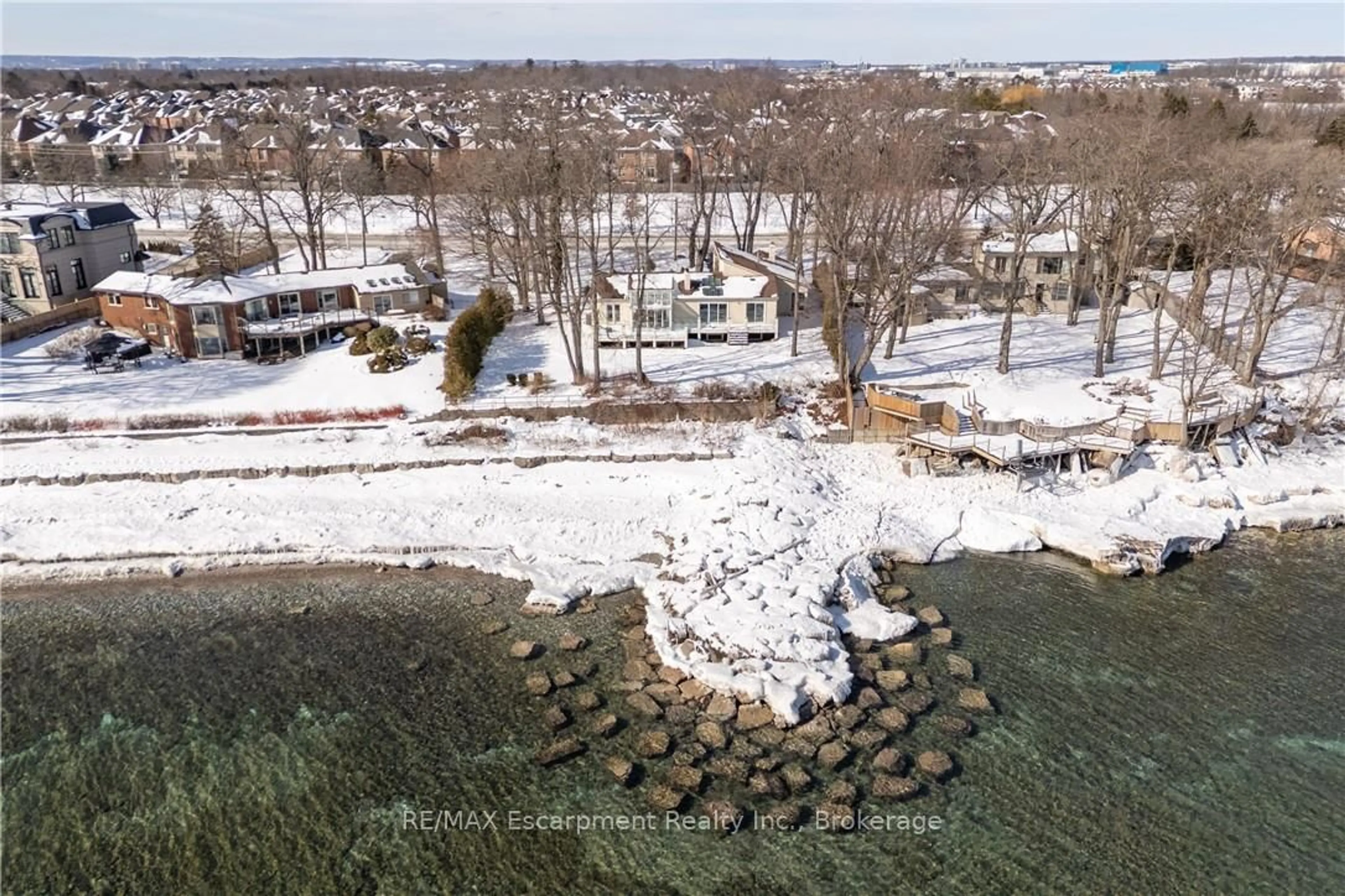 A pic from outside/outdoor area/front of a property/back of a property/a pic from drone, water/lake/river/ocean view for 3346 Lakeshore Rd, Oakville Ontario L6L 6S6
