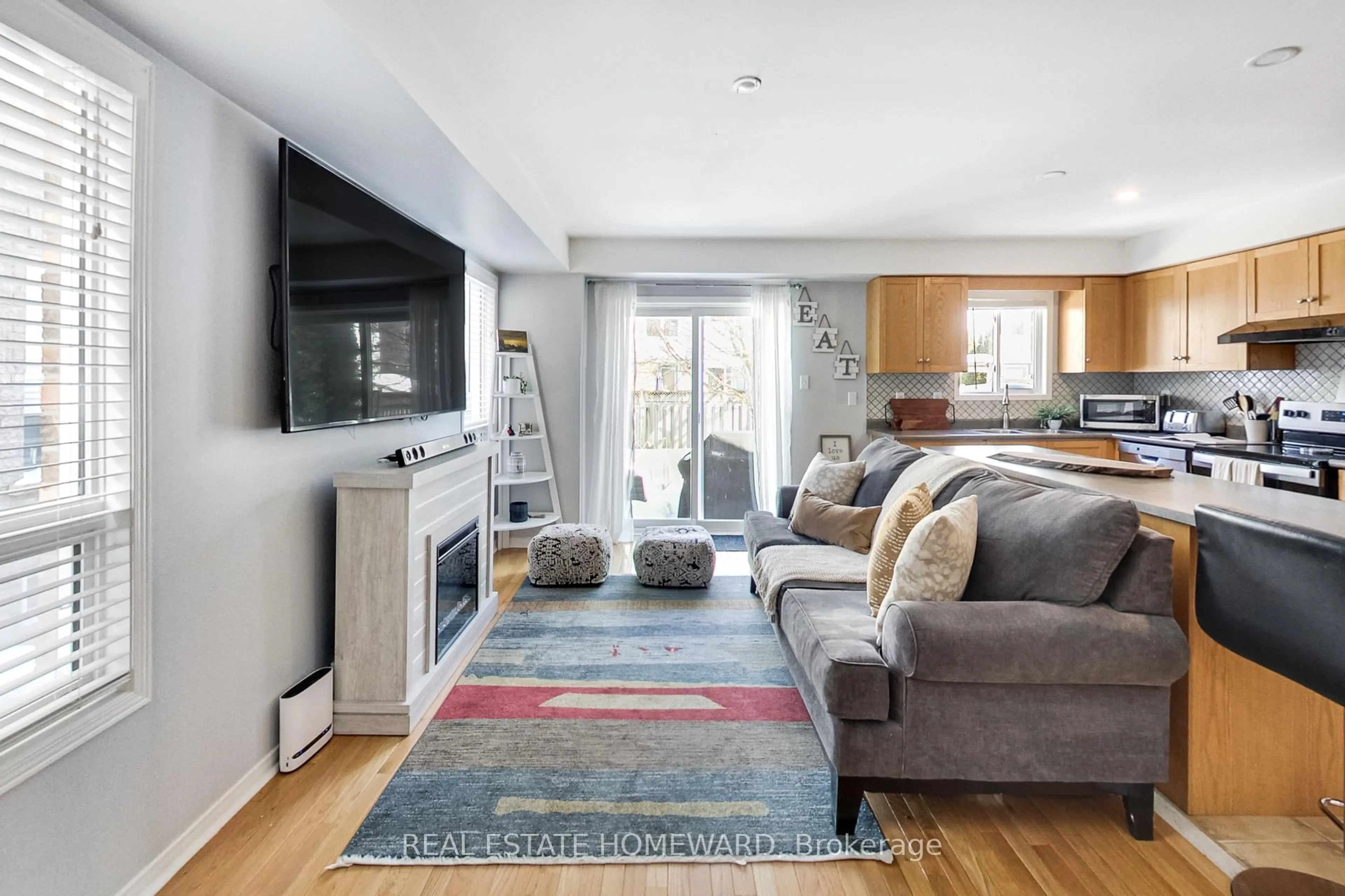 Living room with furniture, unknown for 53 Bradley Dr, Halton Hills Ontario L7G 6B6