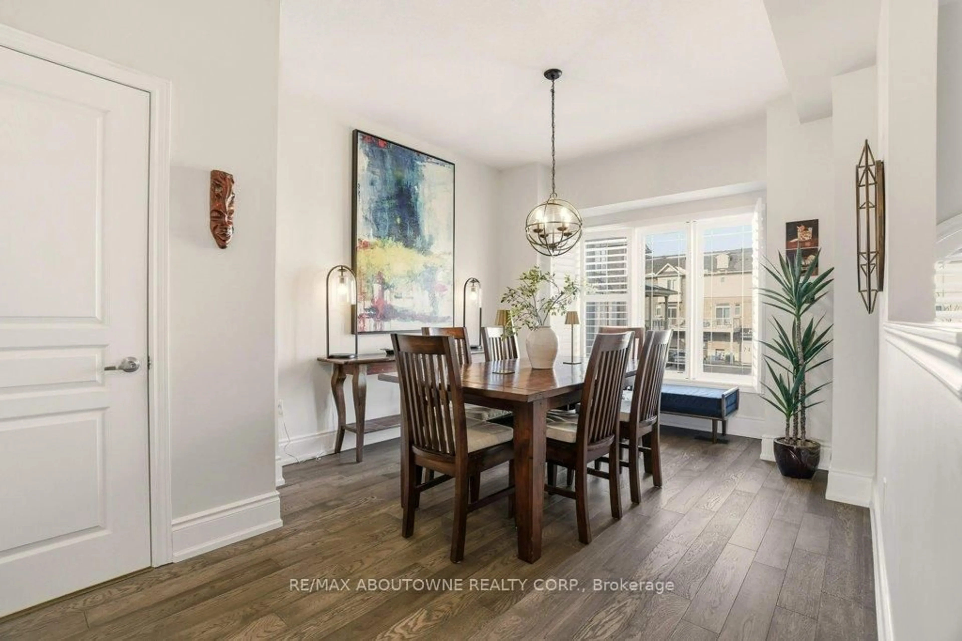 Dining room, wood/laminate floor for 4174 Galileo Common, Burlington Ontario L7L 0G7