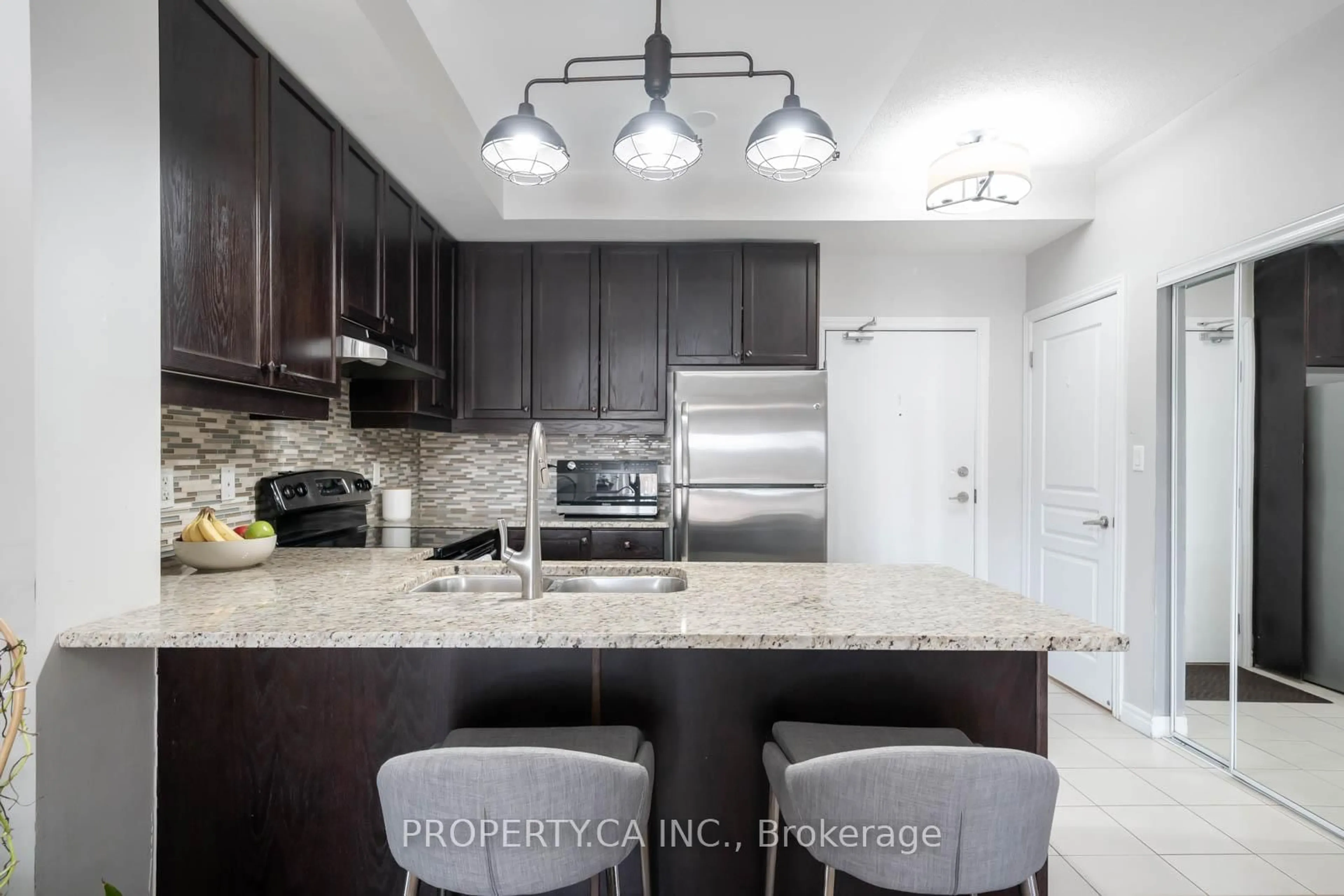 Contemporary kitchen, ceramic/tile floor for 570 Lolita Gdns #144, Mississauga Ontario L5A 0A1