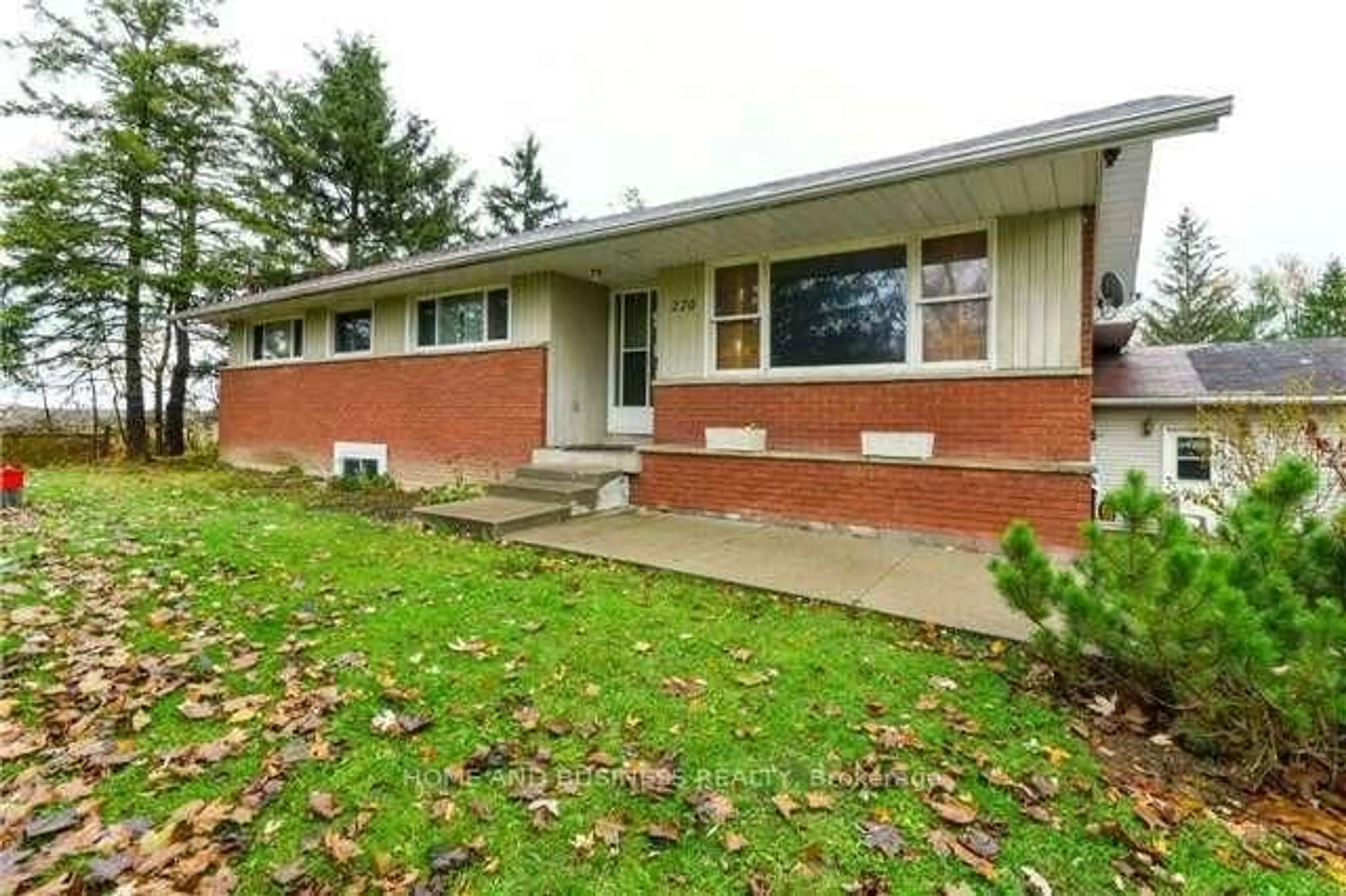 Home with brick exterior material, street for 220 Burnhamthorpe Rd, Oakville Ontario L6H 7B5