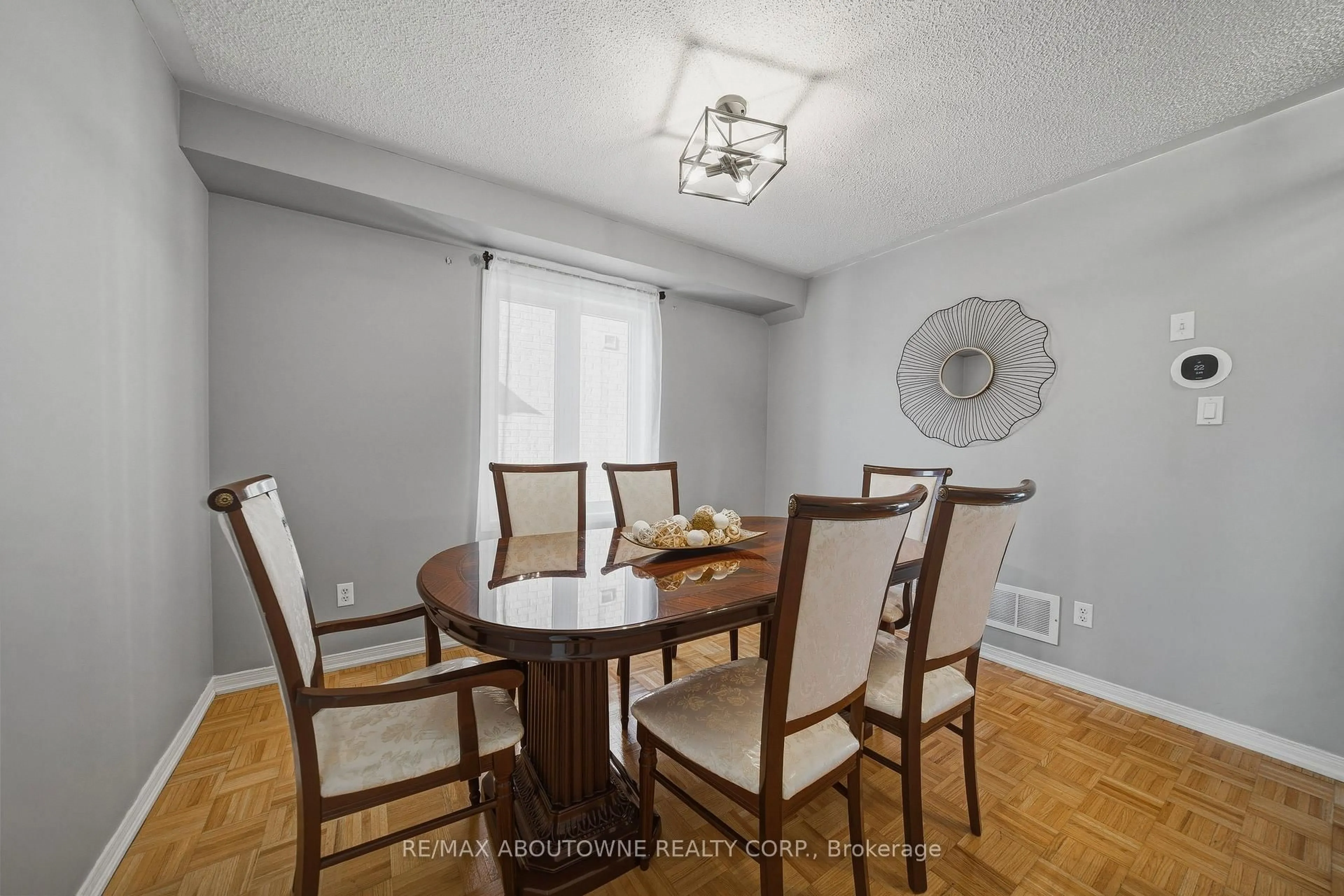 Dining room, wood/laminate floor for 23 Arabia Gate, Brampton Ontario L6R 2N9