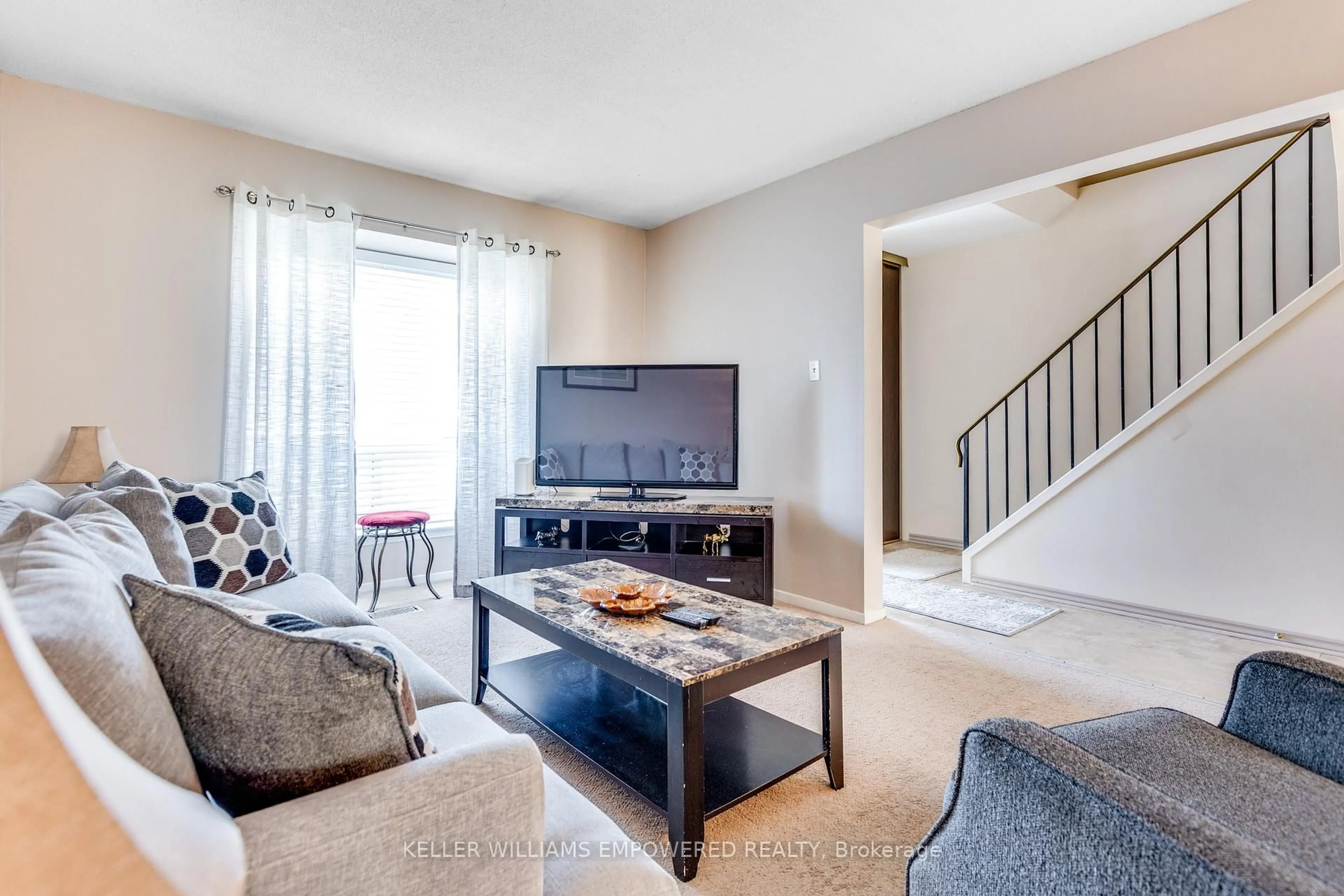 Living room with furniture, unknown for 57 Mcmullen Cres, Brampton Ontario L6S 3M2