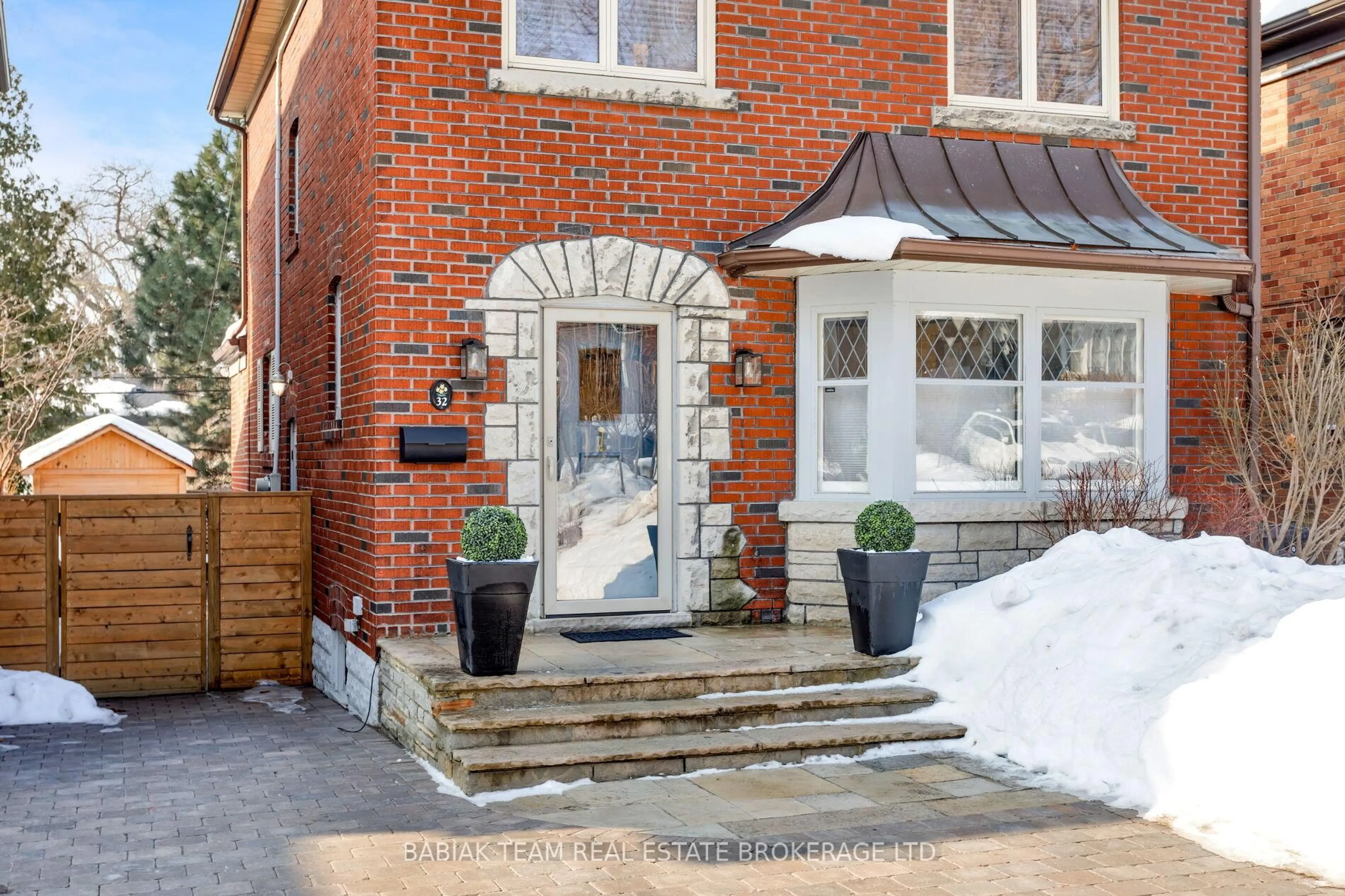 Home with brick exterior material, street for 32 Riverview Gdns, Toronto Ontario M6S 4E5