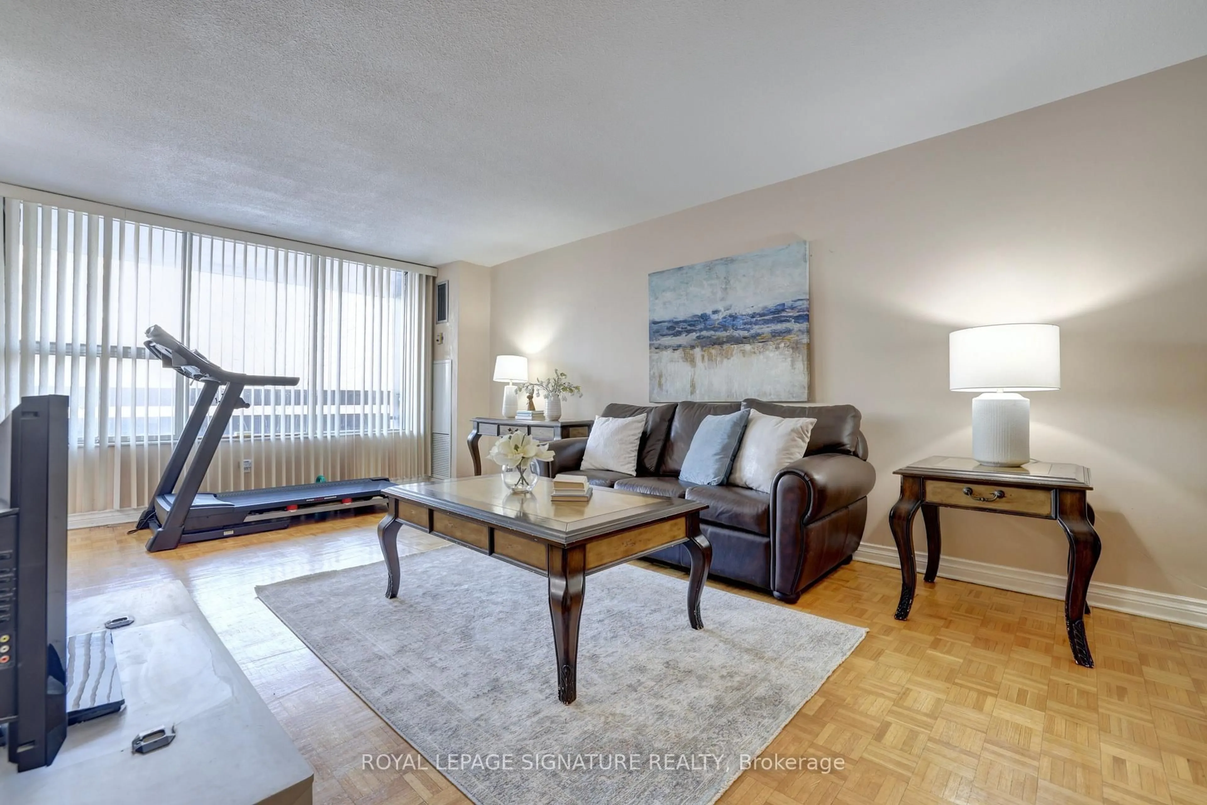 Living room with furniture, unknown for 11 Wincott Dr #201, Toronto Ontario M9R 2R9