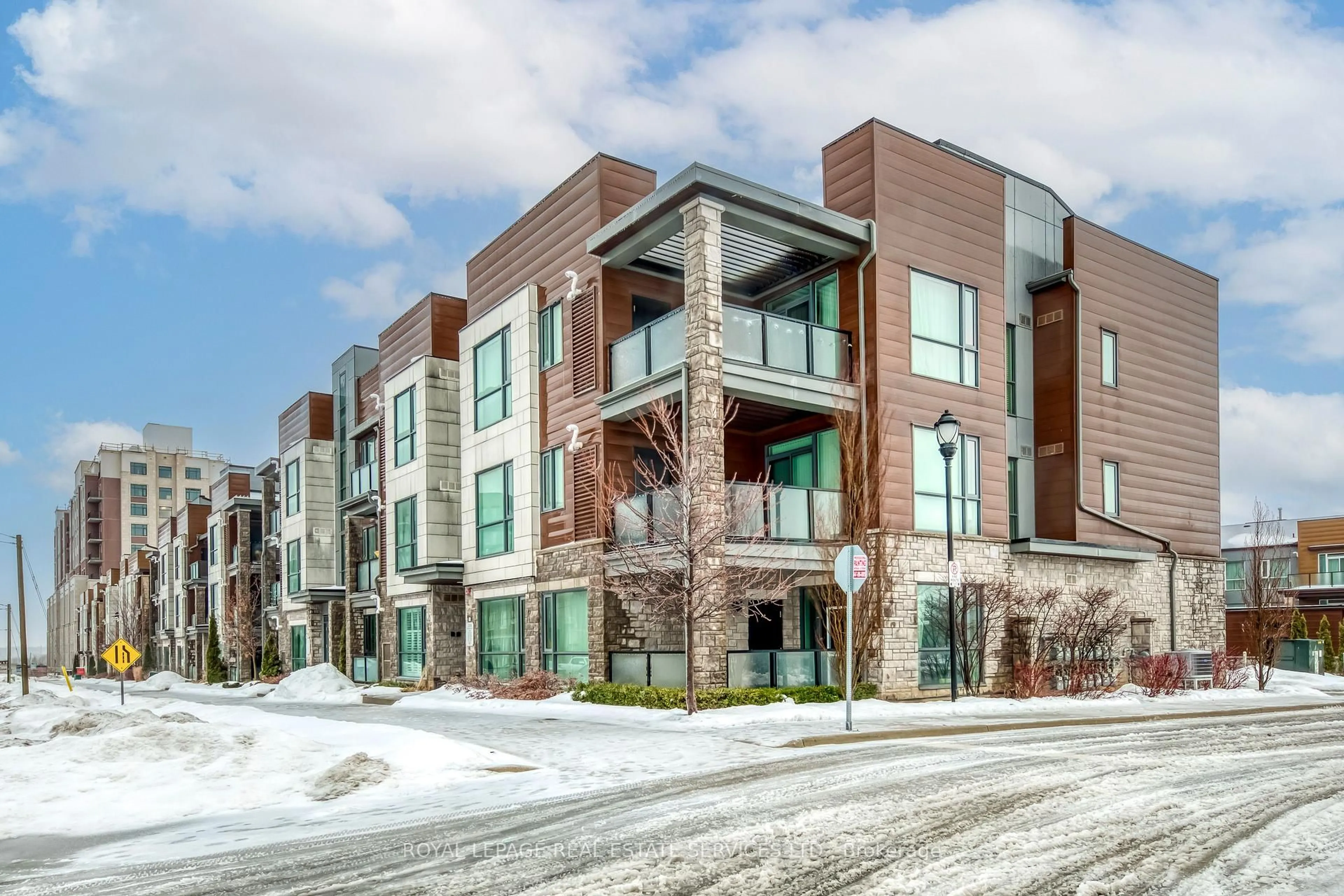 Home with brick exterior material, street for 2388 Khalsa Gate #307, Oakville Ontario L6M 4J2