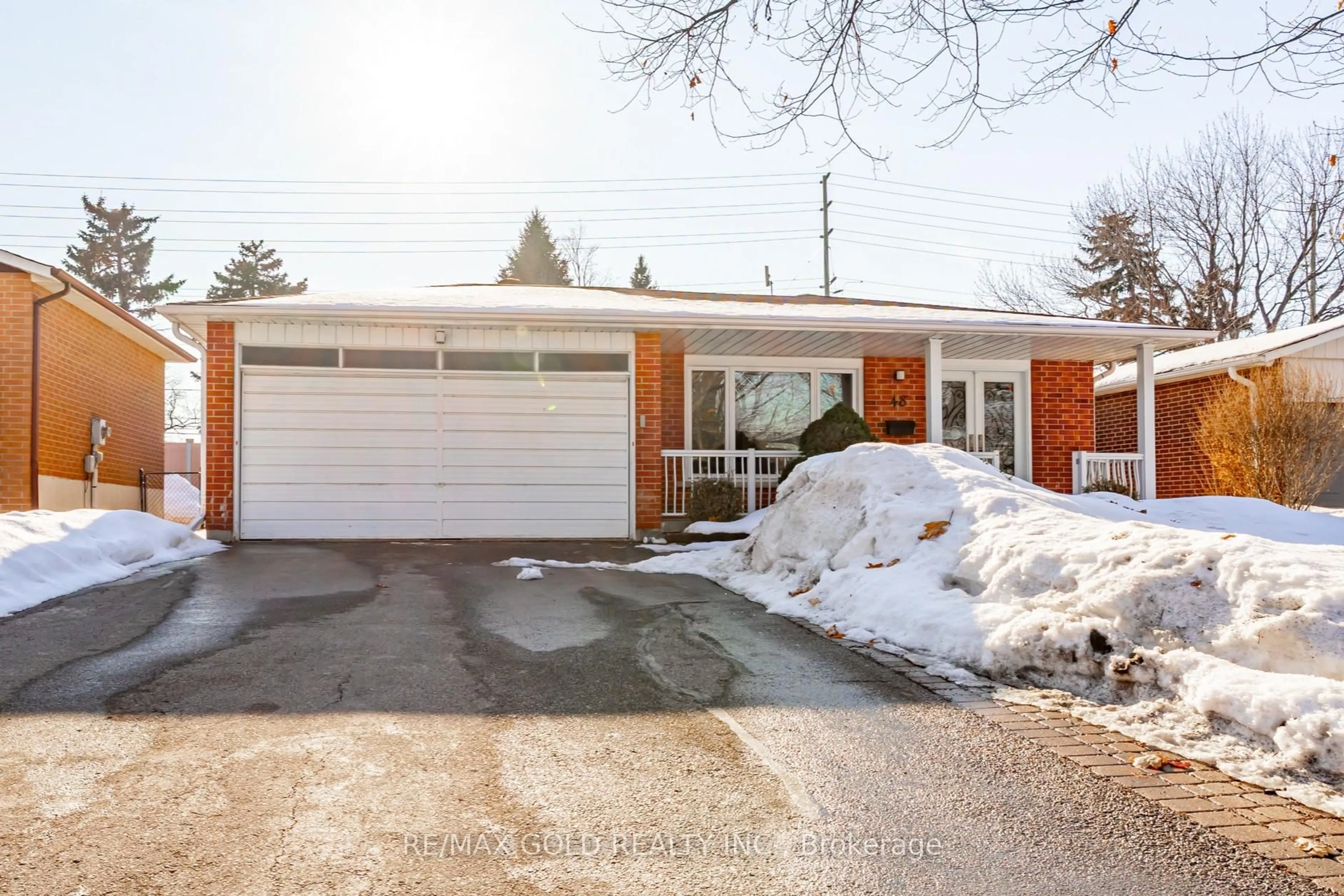 Home with brick exterior material, street for 48 Malcolm Cres, Brampton Ontario L6S 3C8