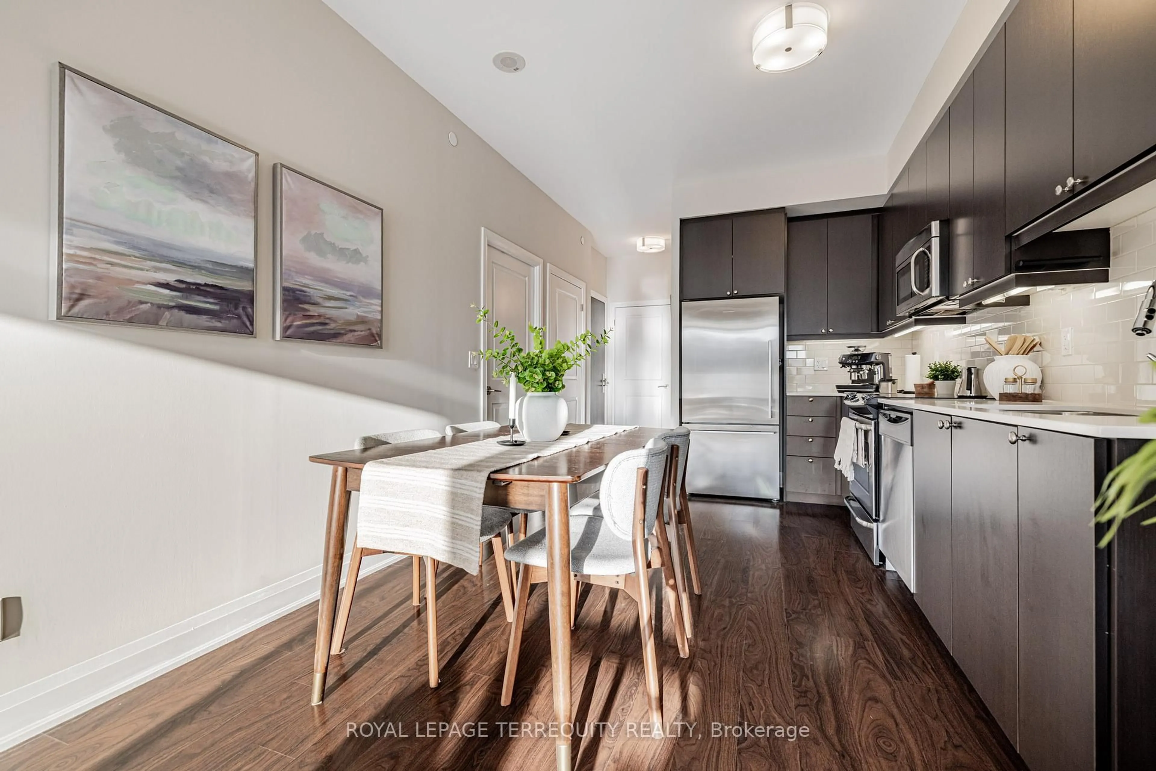 Open concept kitchen, wood/laminate floor for 35 Fontenay Crt #401, Toronto Ontario M9A 0E2