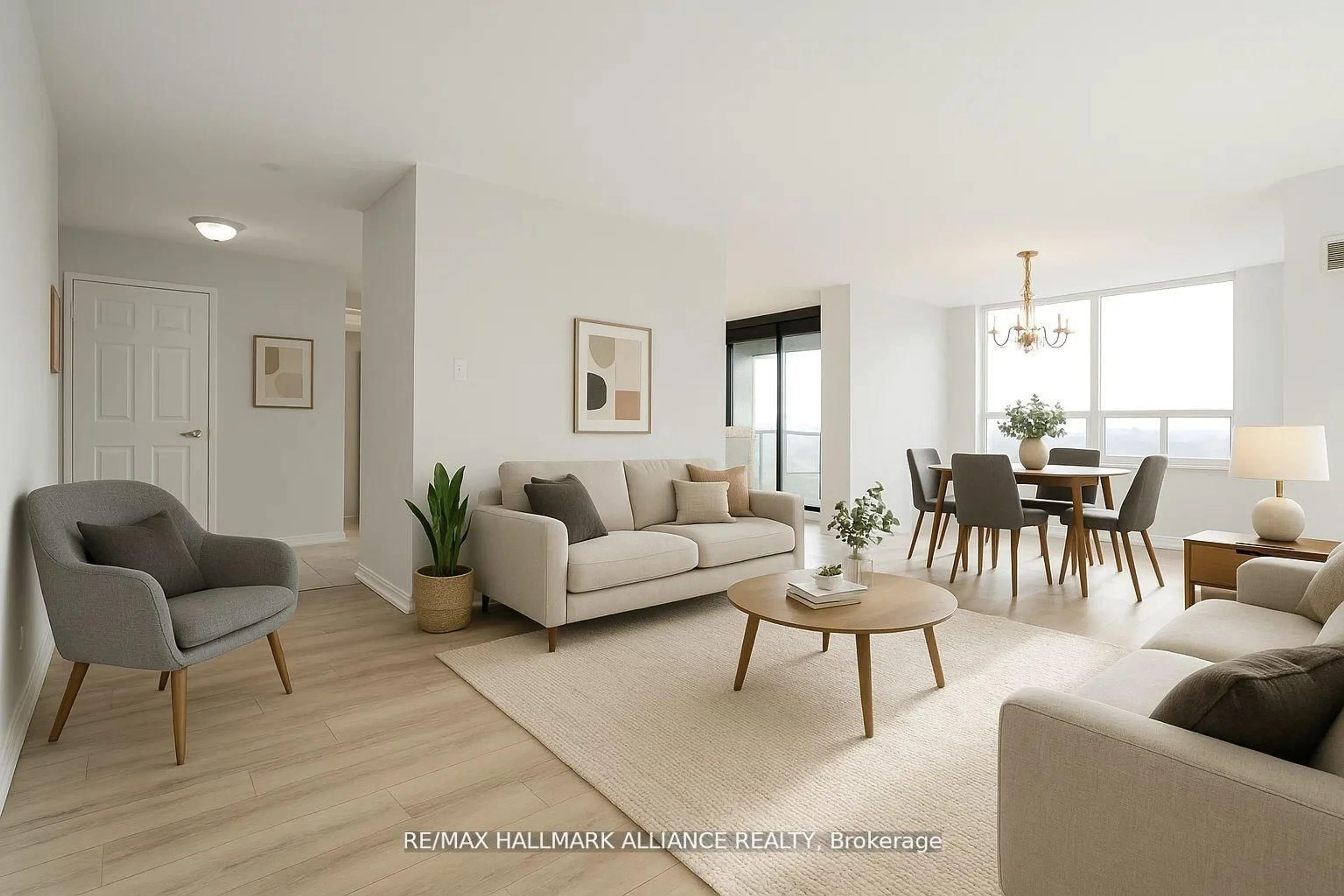 Living room with furniture, unknown for 30 Malta Ave #307, Brampton Ontario L6Y 4W6