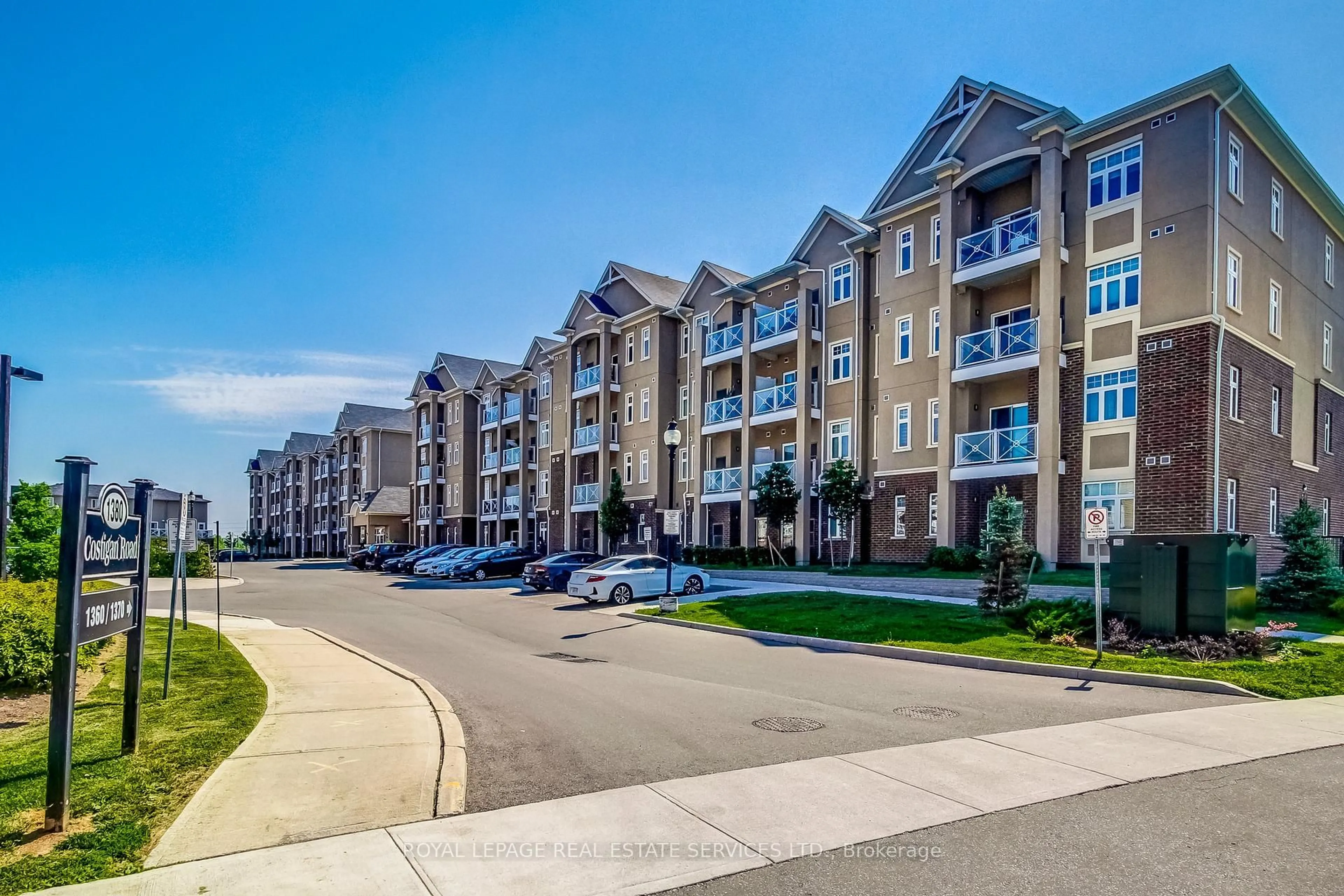 A pic from outside/outdoor area/front of a property/back of a property/a pic from drone, street for 1360 Costigan Rd #211, Milton Ontario L9T 0Y8