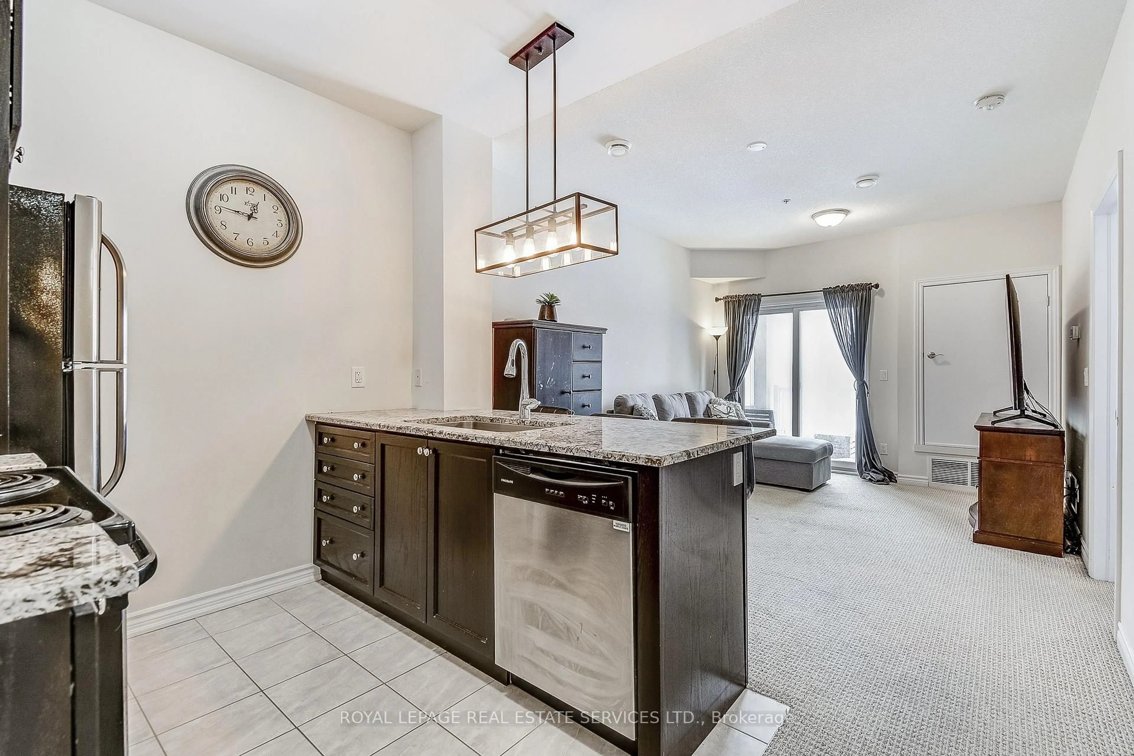 Open concept kitchen, ceramic/tile floor for 1360 Costigan Rd #211, Milton Ontario L9T 0Y8