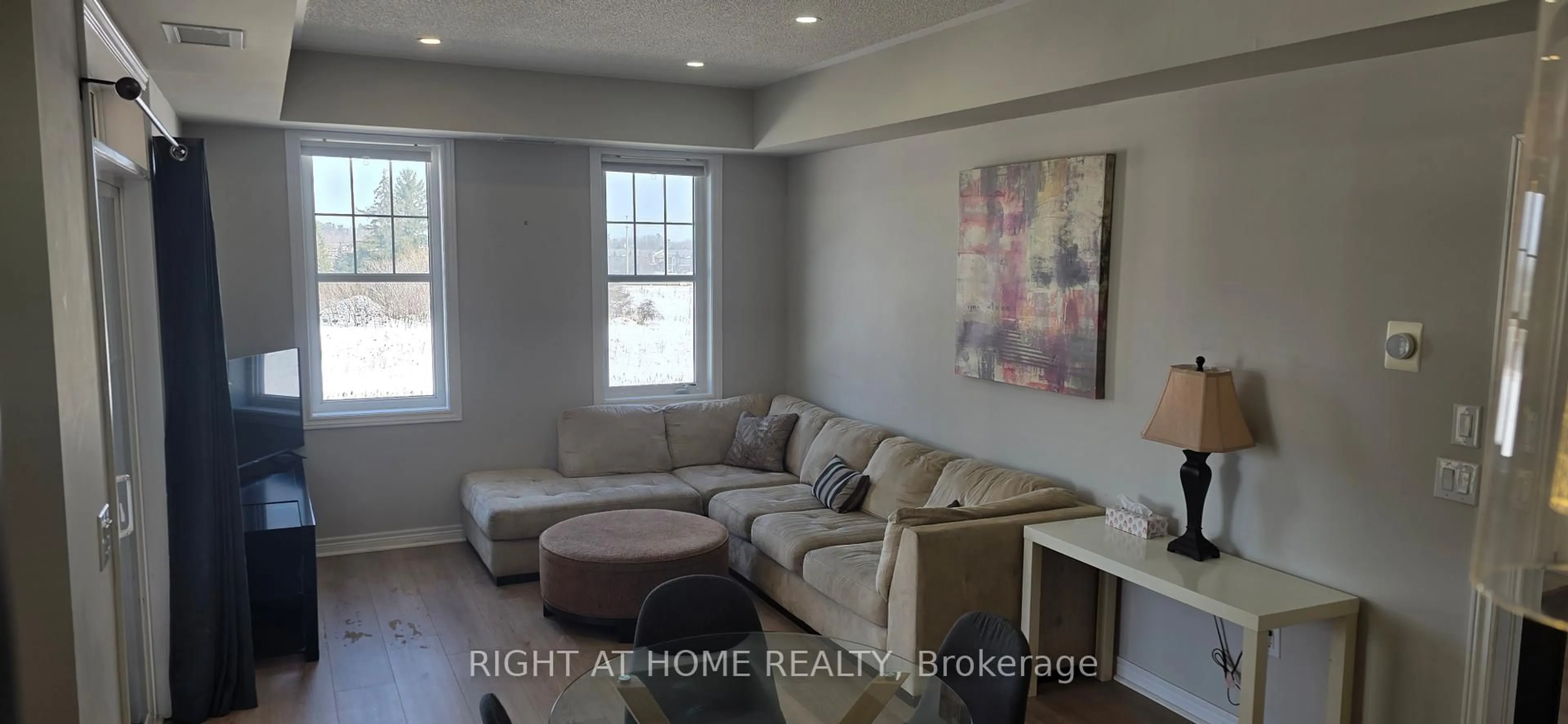 Living room with furniture, unknown for 272 Georgian Dr #301, Oakville Ontario L6H 7K1