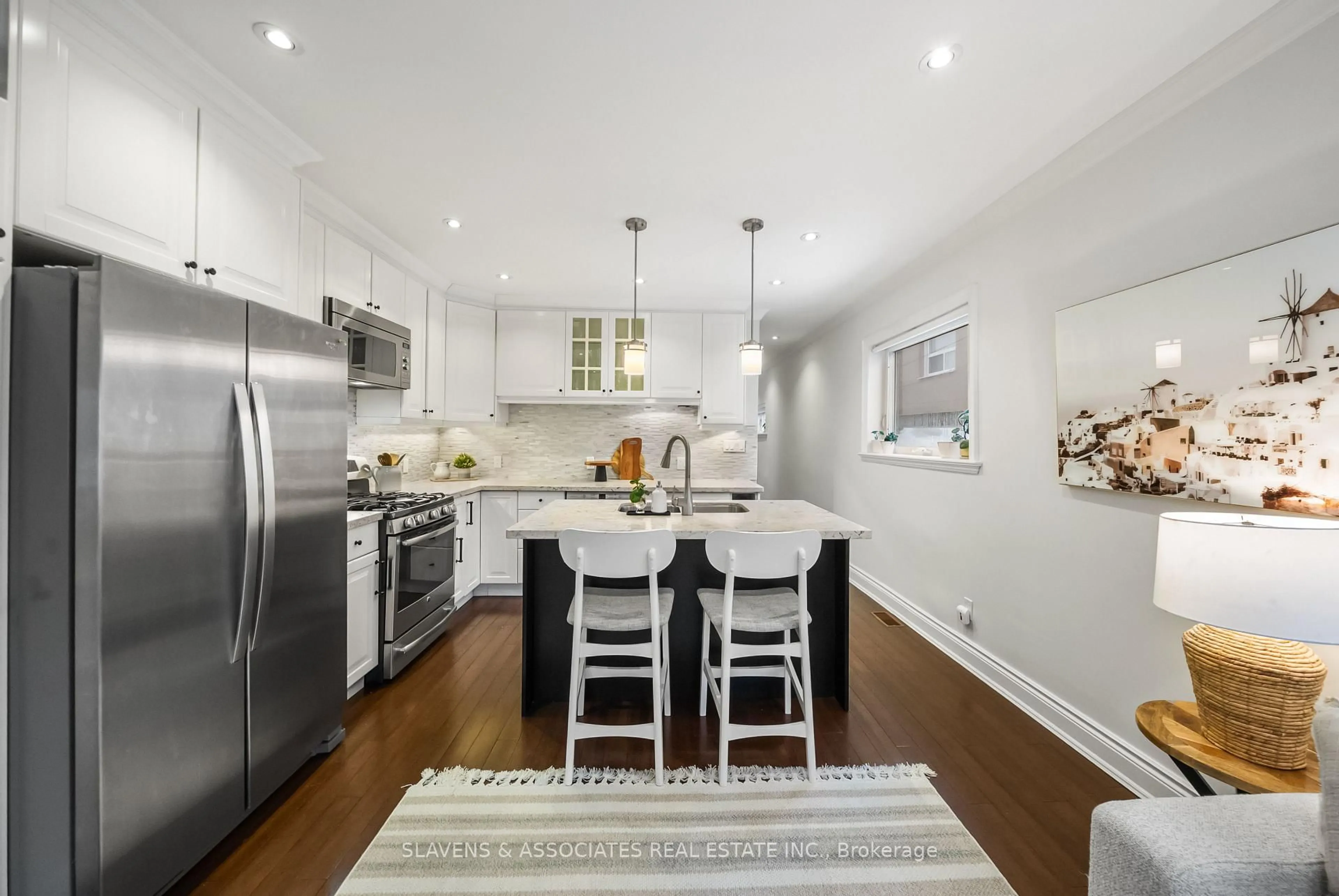 Open concept kitchen, unknown for 131 Boon Ave, Toronto Ontario M6E 3Z6