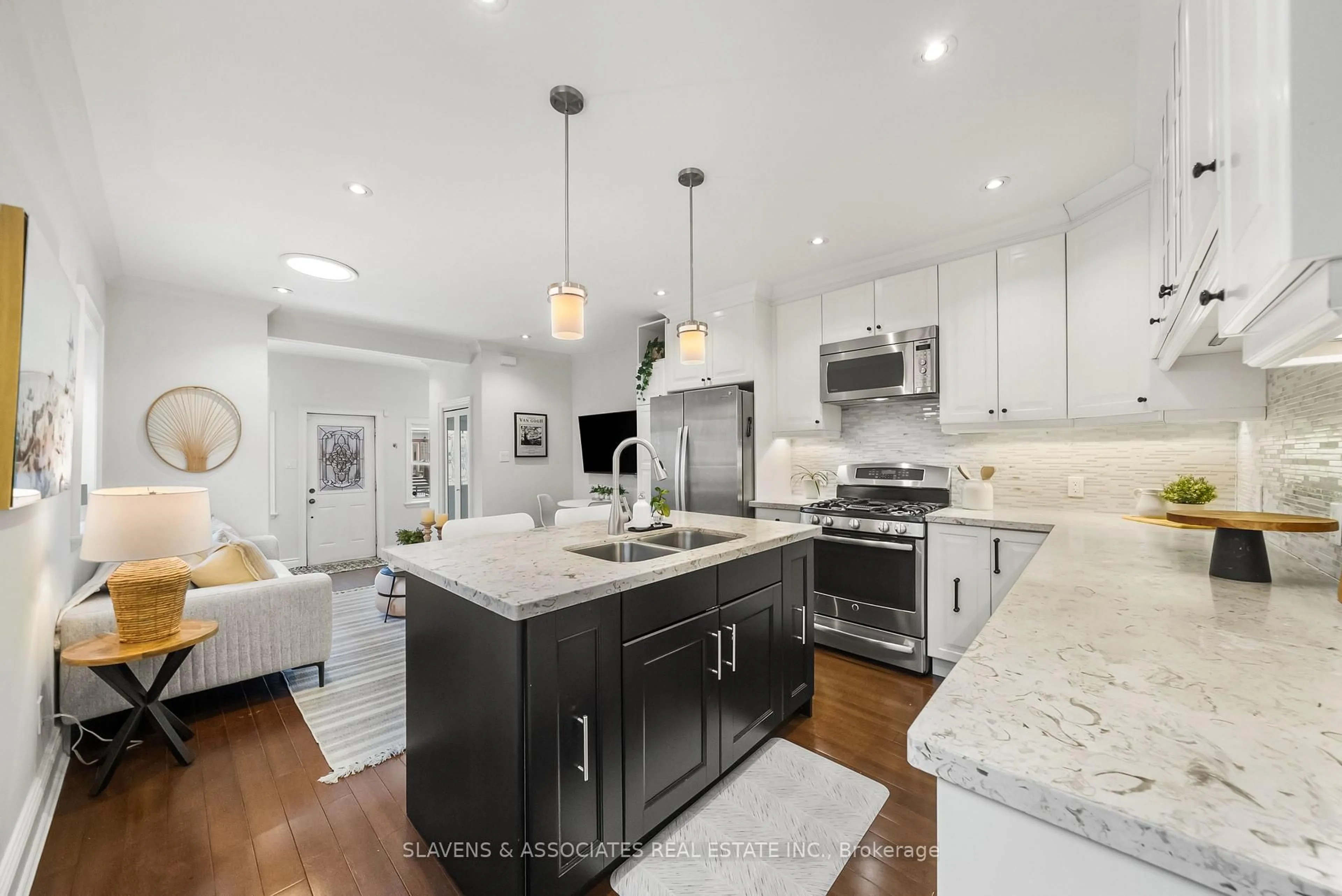 Open concept kitchen, unknown for 131 Boon Ave, Toronto Ontario M6E 3Z6