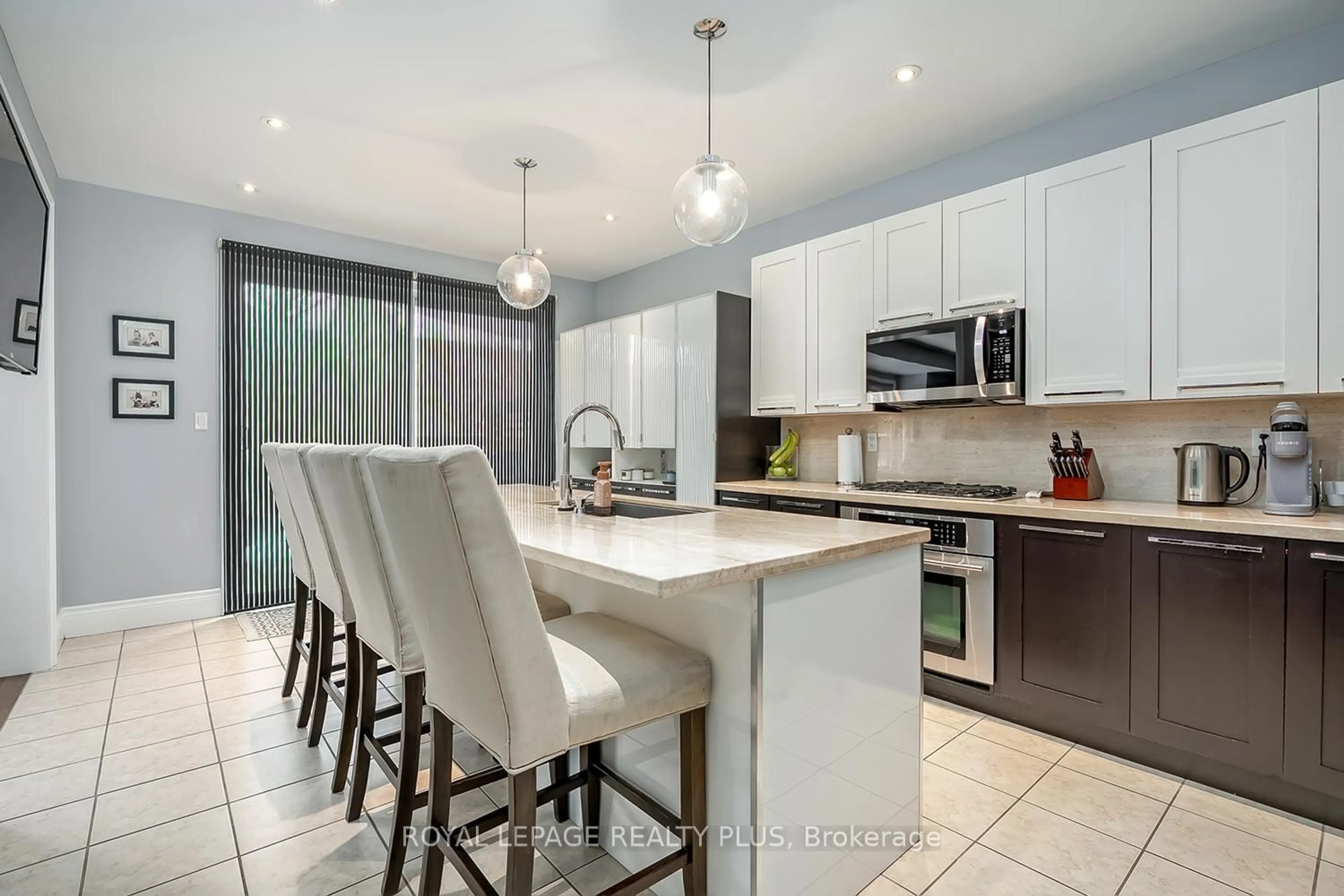 Open concept kitchen, ceramic/tile floor for 329 Tonelli Lane, Milton Ontario L9T 0N8