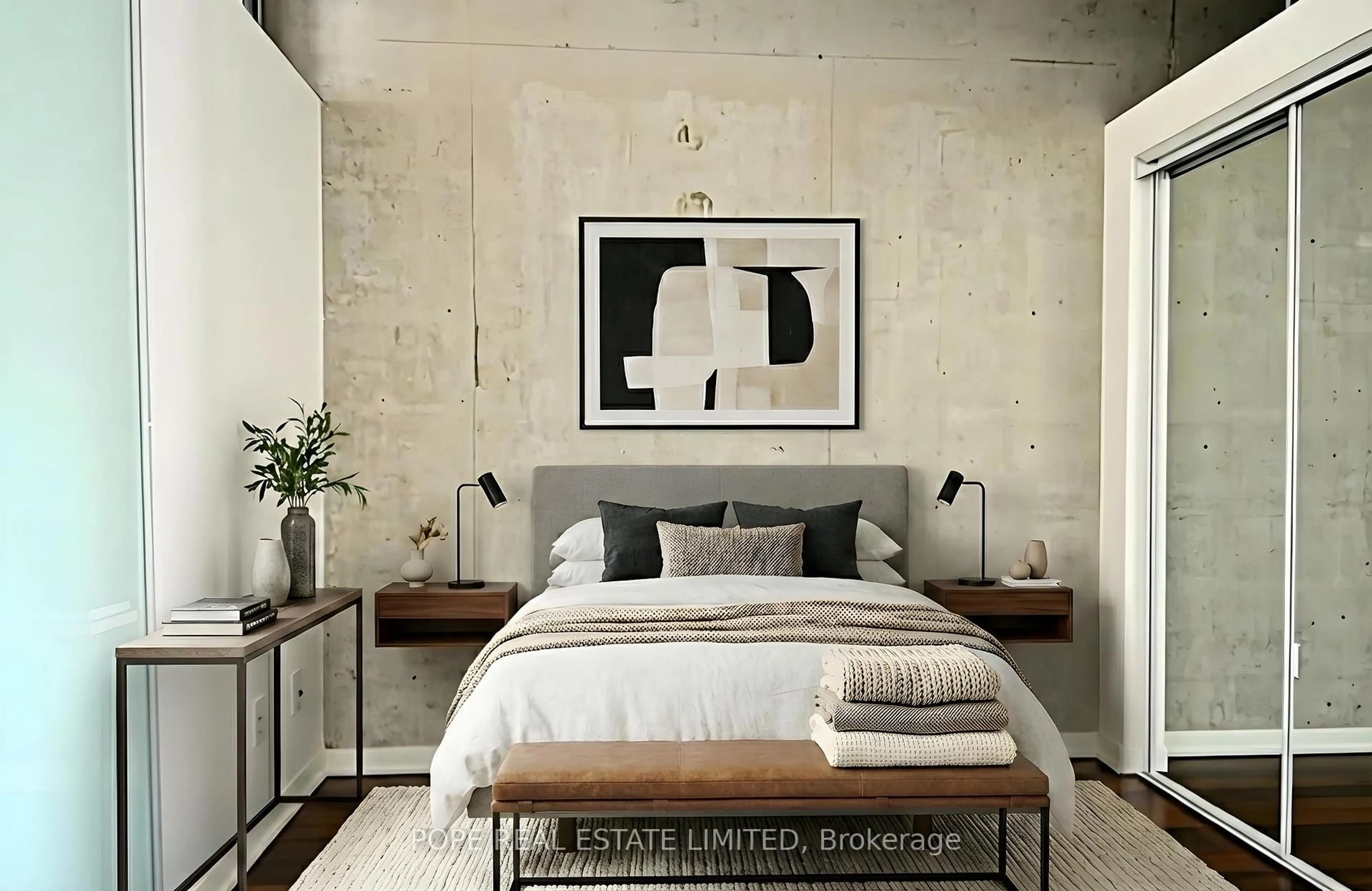 Bedroom with bed, cement floor for 38 Joe Shuster Way #312, Toronto Ontario M6K 0A5