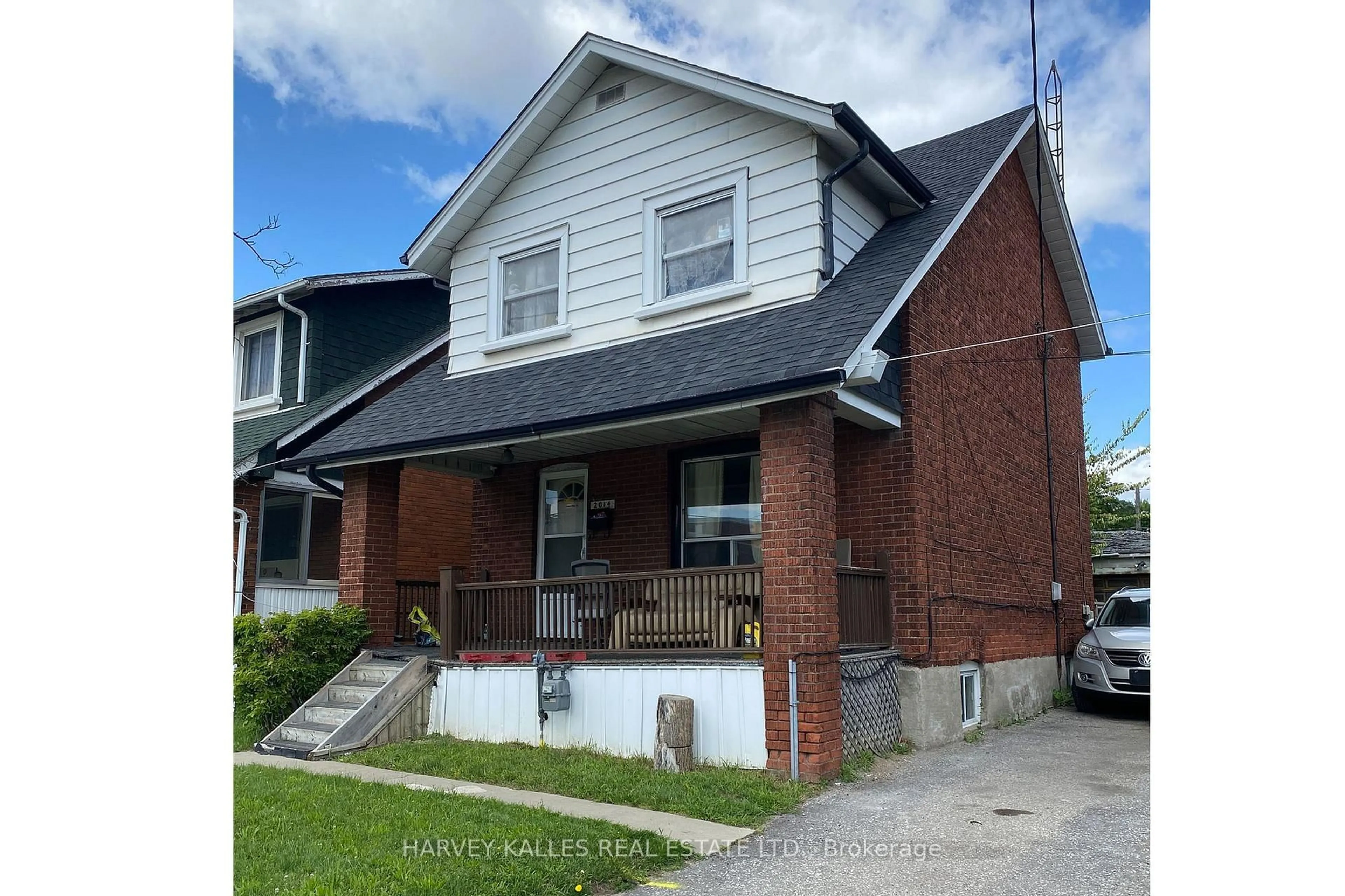 Home with brick exterior material, street for 2014 Lawrence Ave, Toronto Ontario M9N 1H4