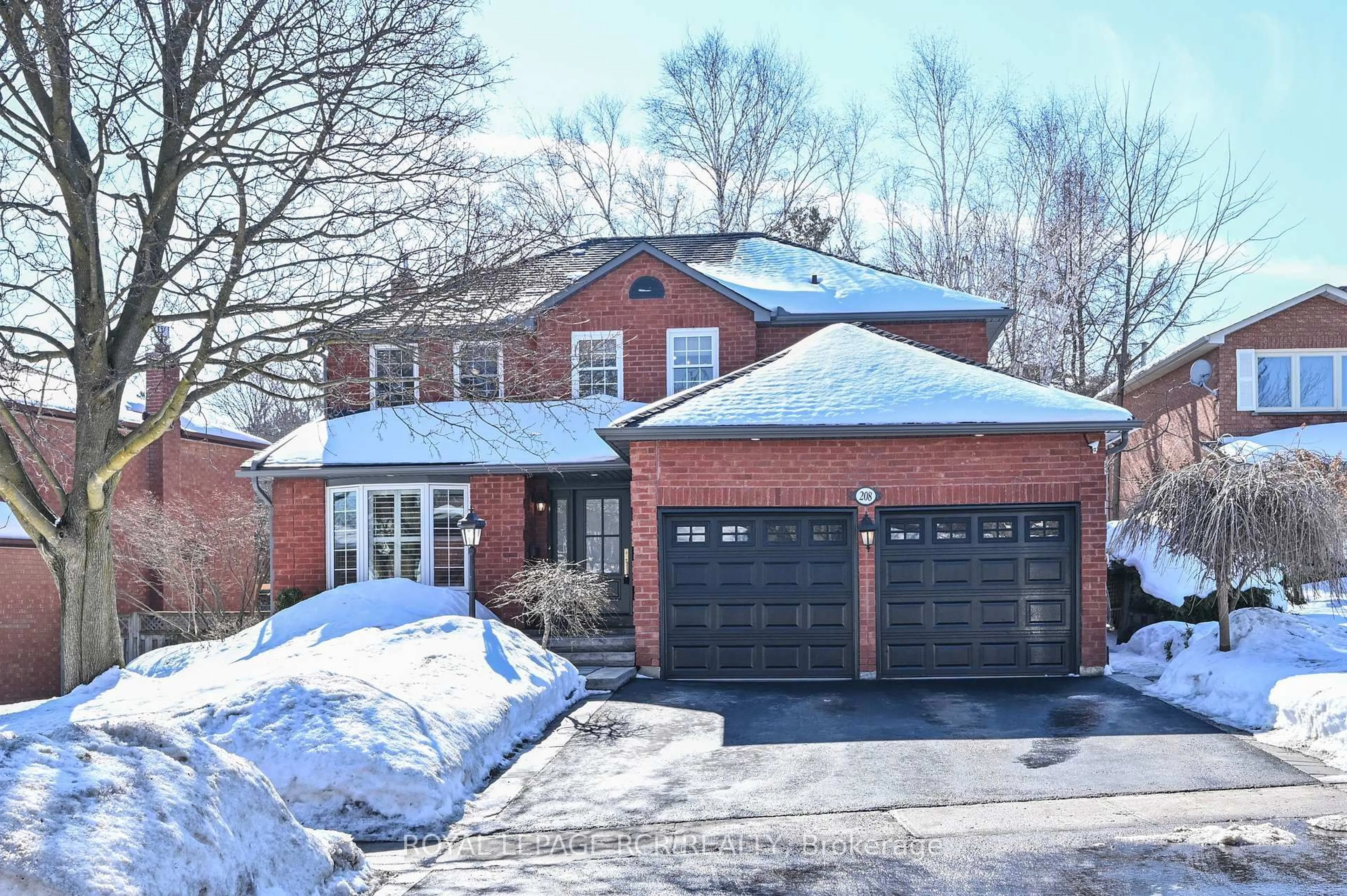 Home with brick exterior material, street for 208 Kensington Pl, Orangeville Ontario L9W 4G5