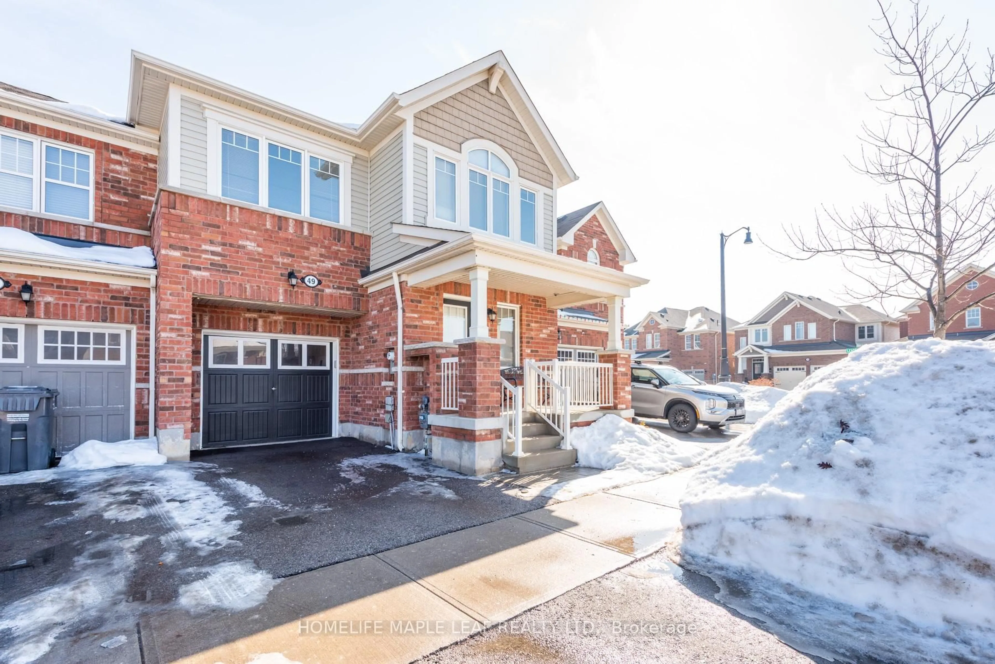 Home with brick exterior material, street for 49 Lothbury Dr, Brampton Ontario L7A 4G6