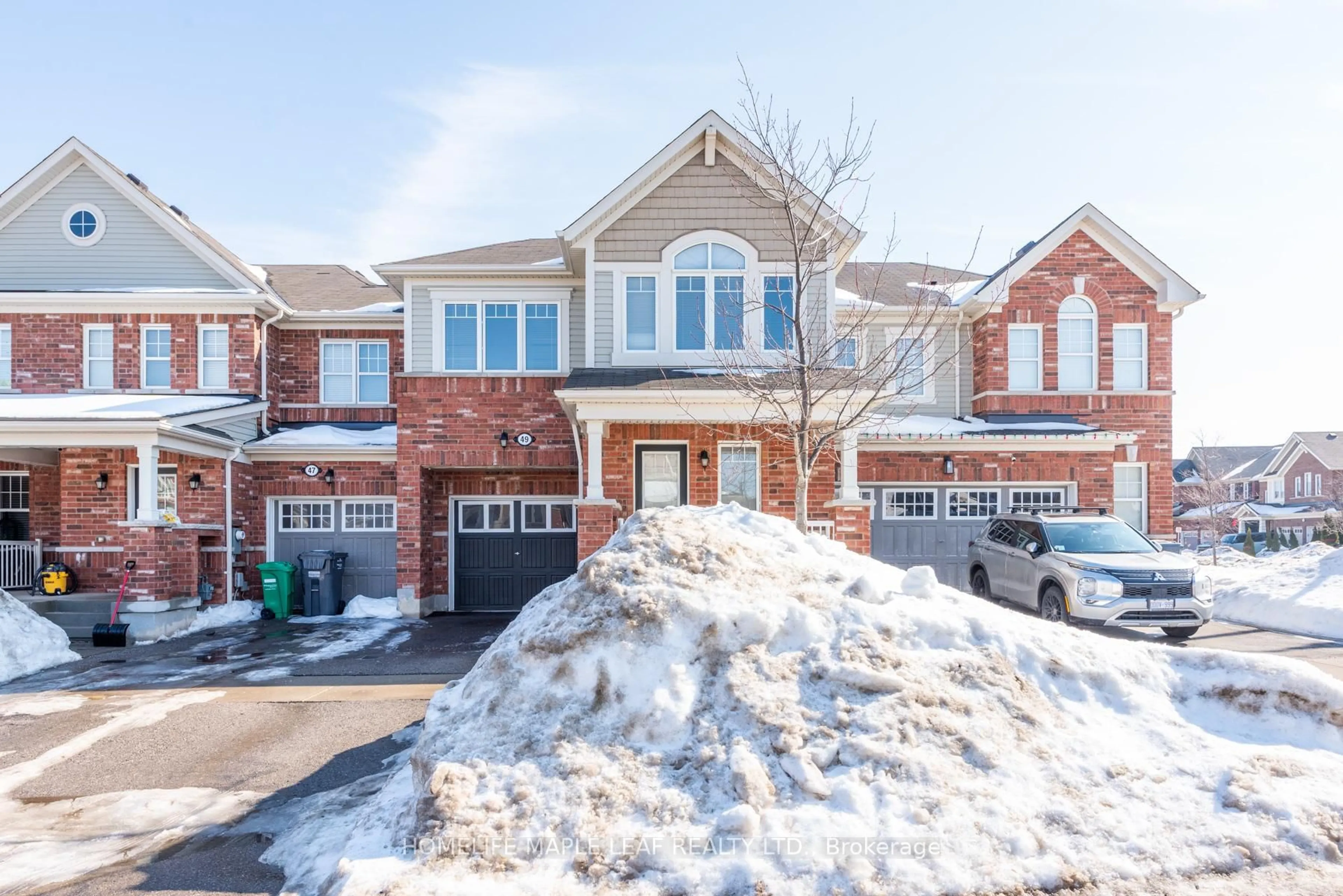 Home with brick exterior material, street for 49 Lothbury Dr, Brampton Ontario L7A 4G6