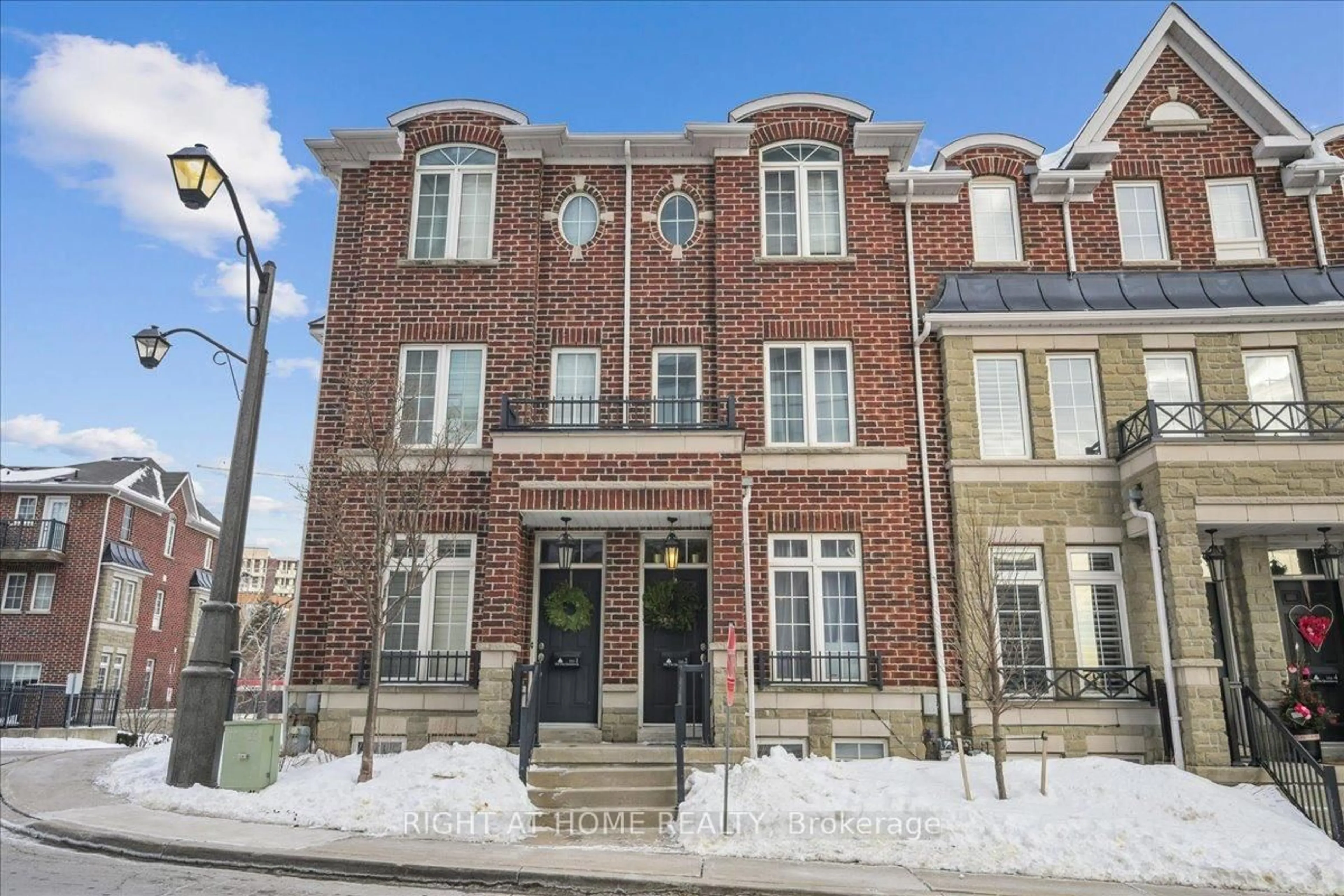 Home with brick exterior material, street for 101 The Queensway #TH 2, Toronto Ontario M8Z 0H1