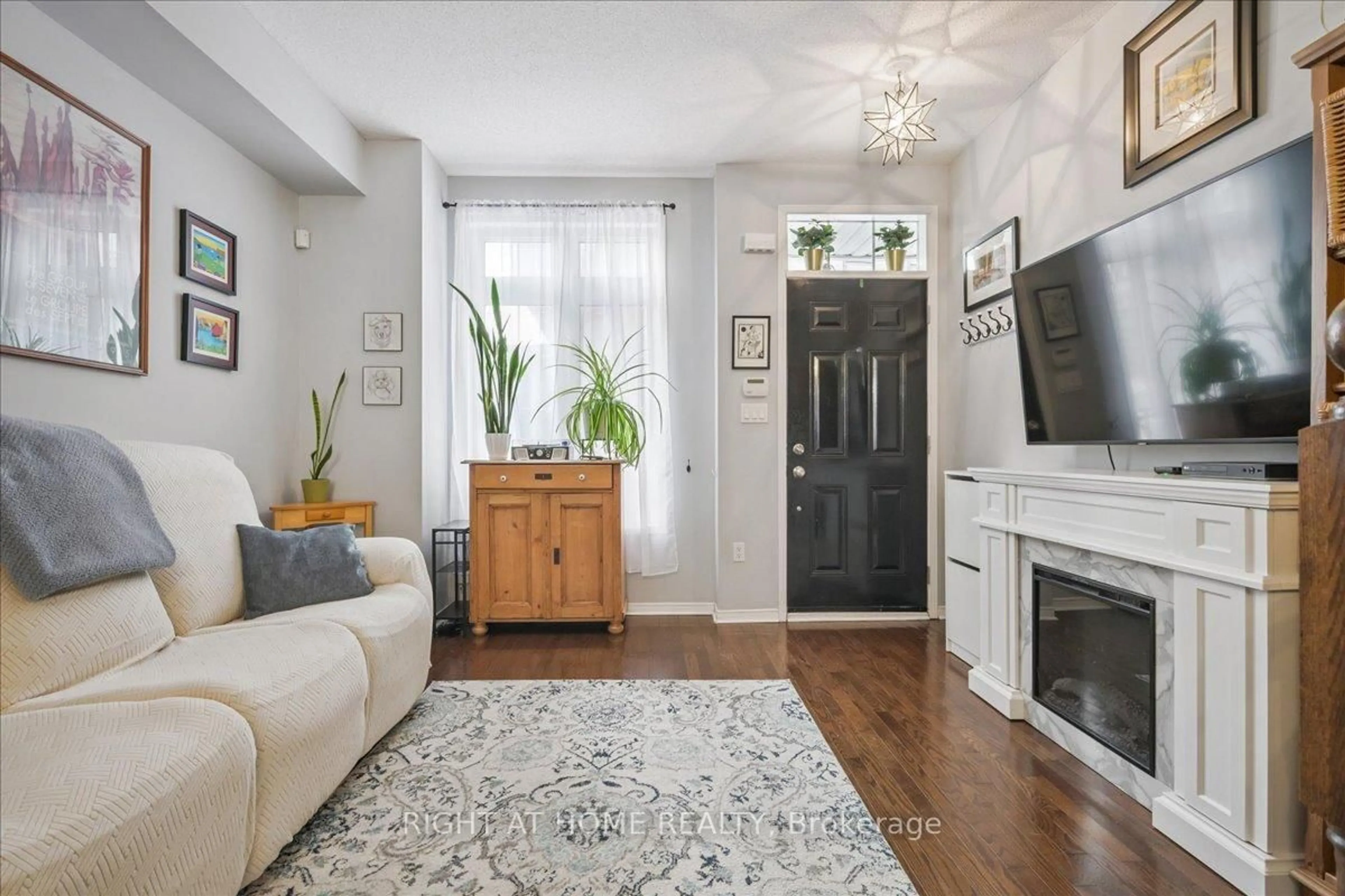 Living room with furniture, unknown for 101 The Queensway #TH 2, Toronto Ontario M8Z 0H1