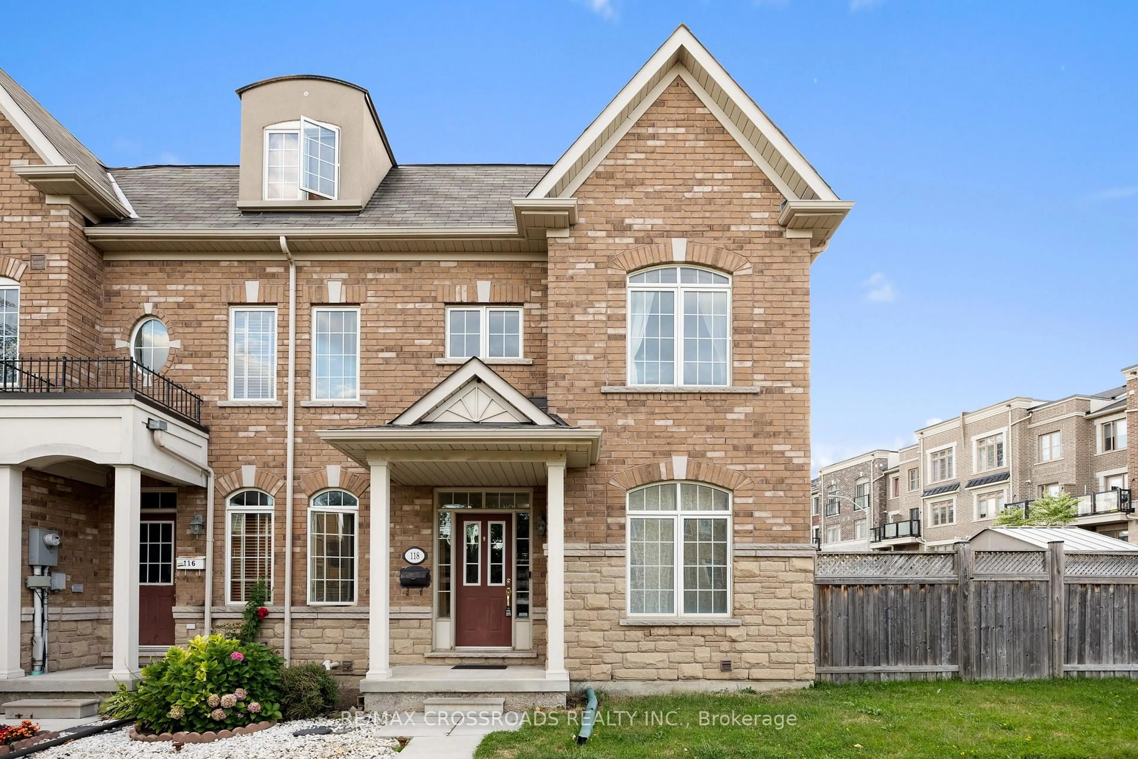 Home with brick exterior material, street for 118 Mary Chapman Blvd, Toronto Ontario M9M 0B3