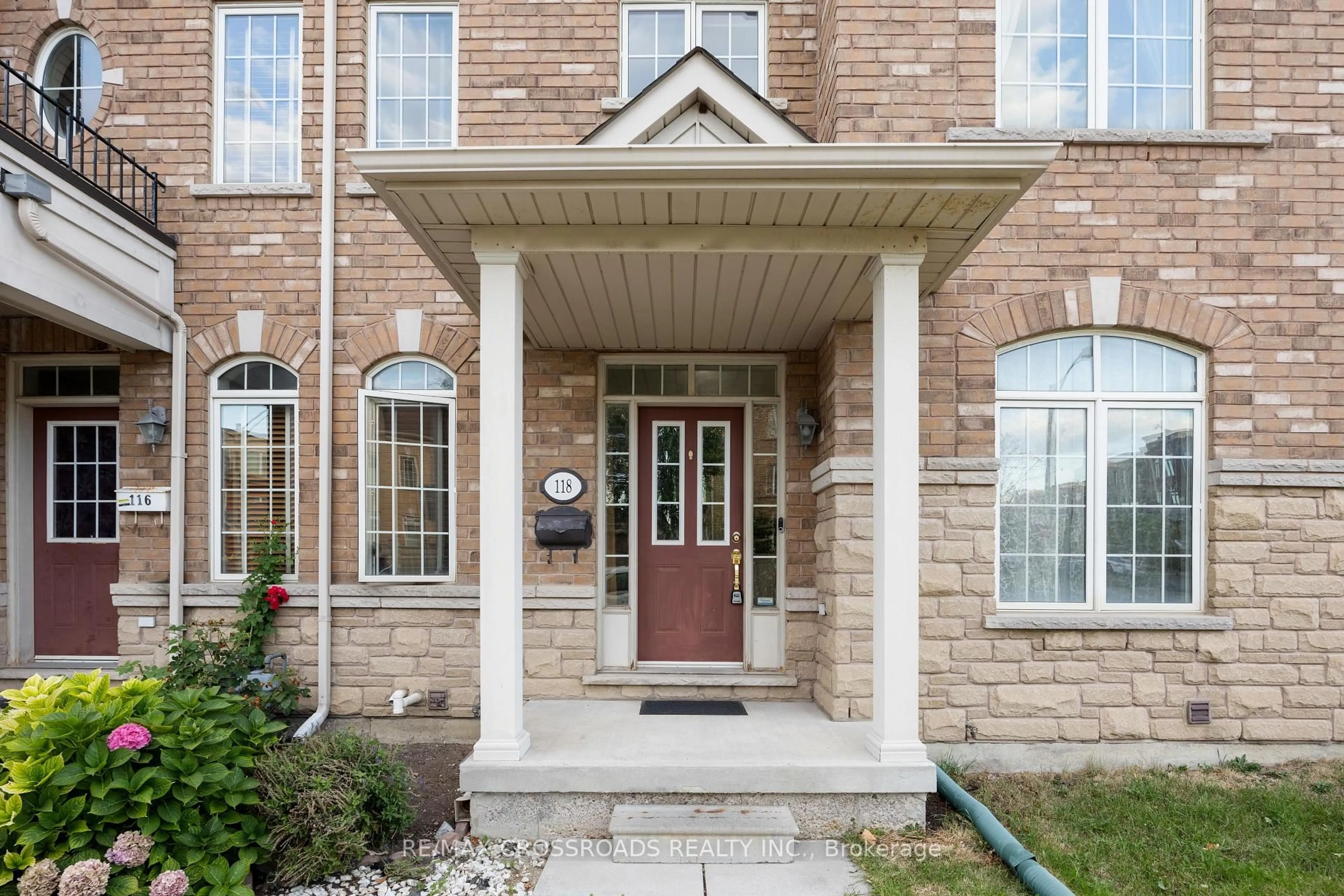 Home with brick exterior material, street for 118 Mary Chapman Blvd, Toronto Ontario M9M 0B3