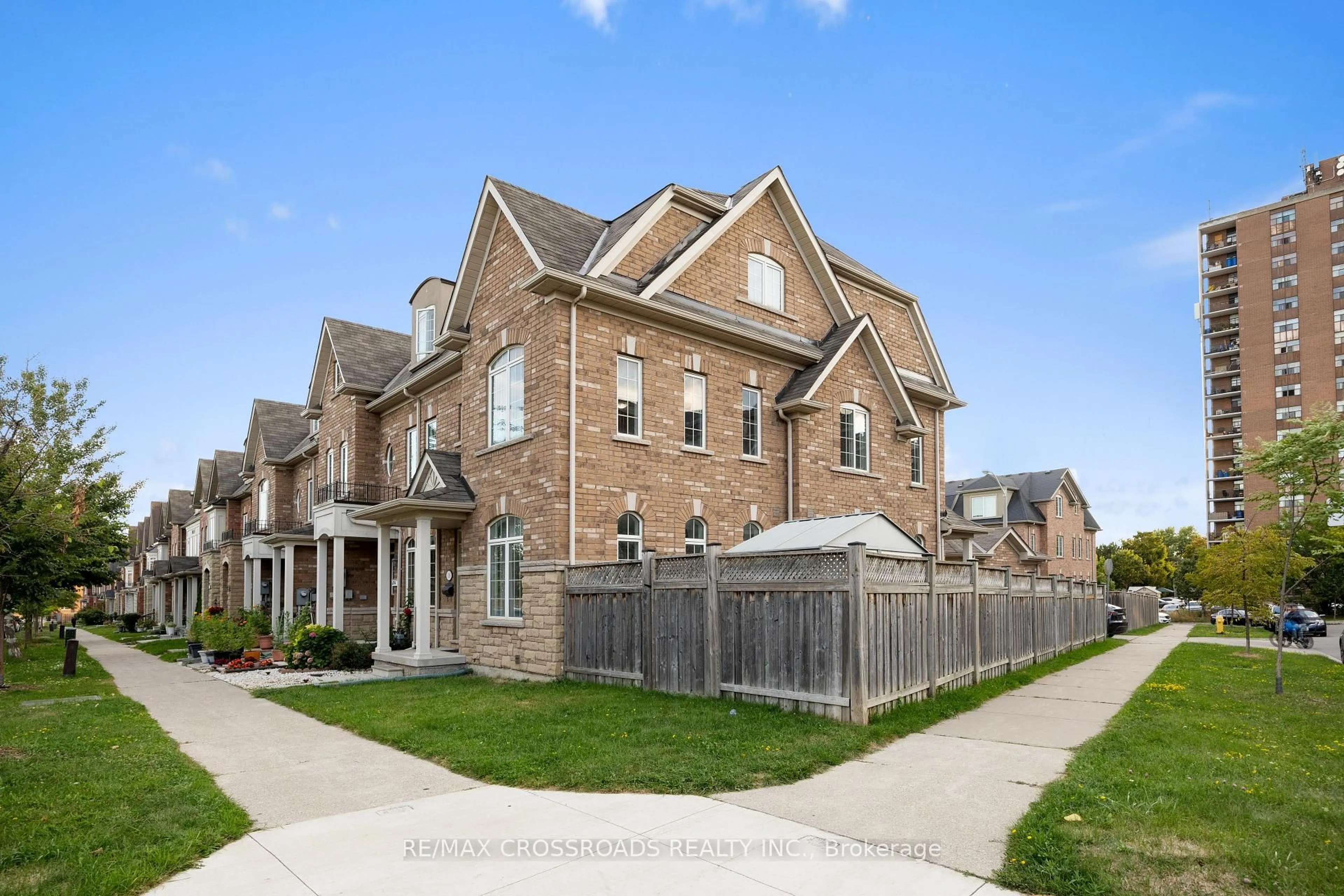 Home with brick exterior material, street for 118 Mary Chapman Blvd, Toronto Ontario M9M 0B3