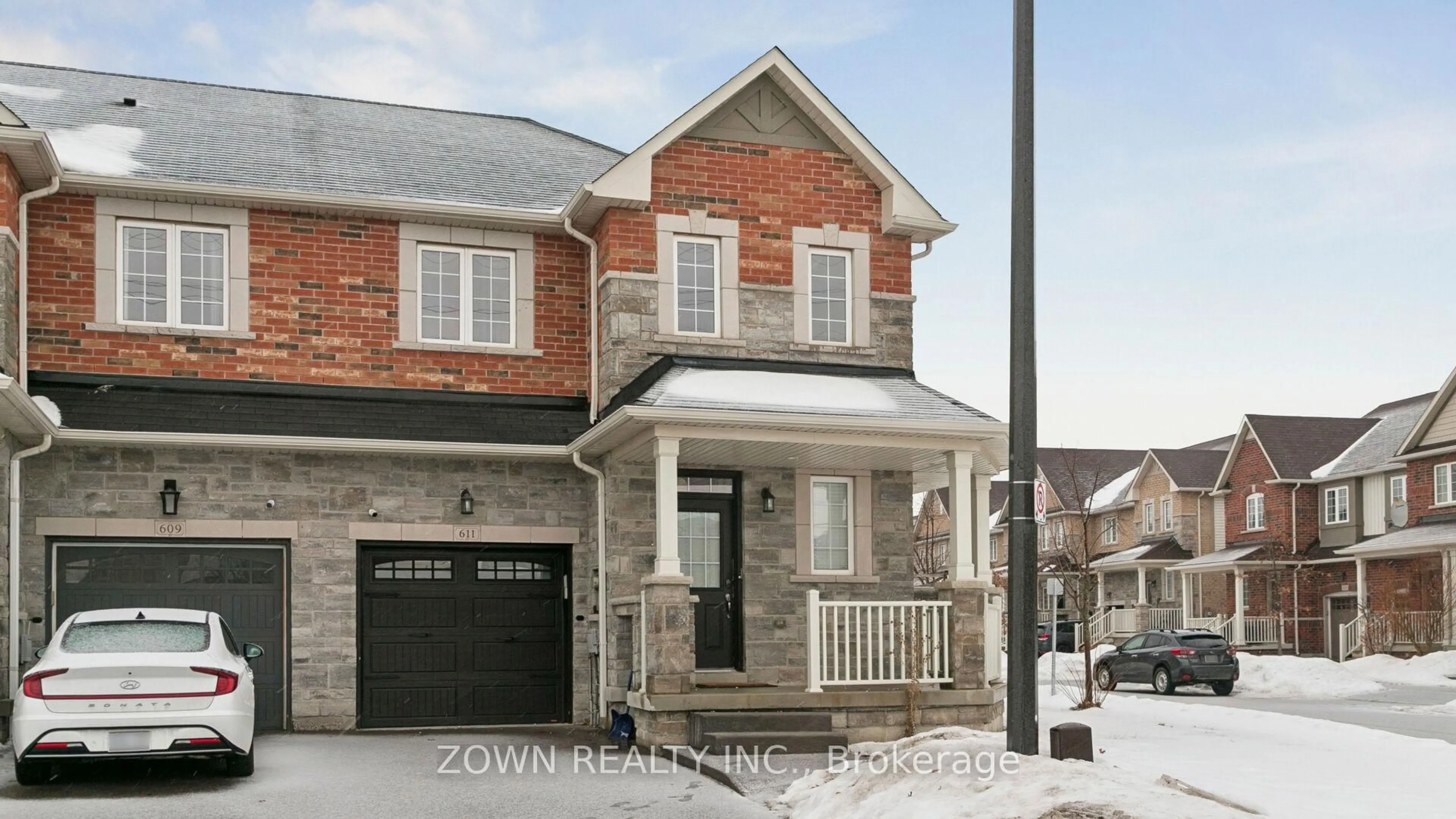Home with brick exterior material, street for 611 MURRAY MEADOWS Pl, Milton Ontario L9T 8L7