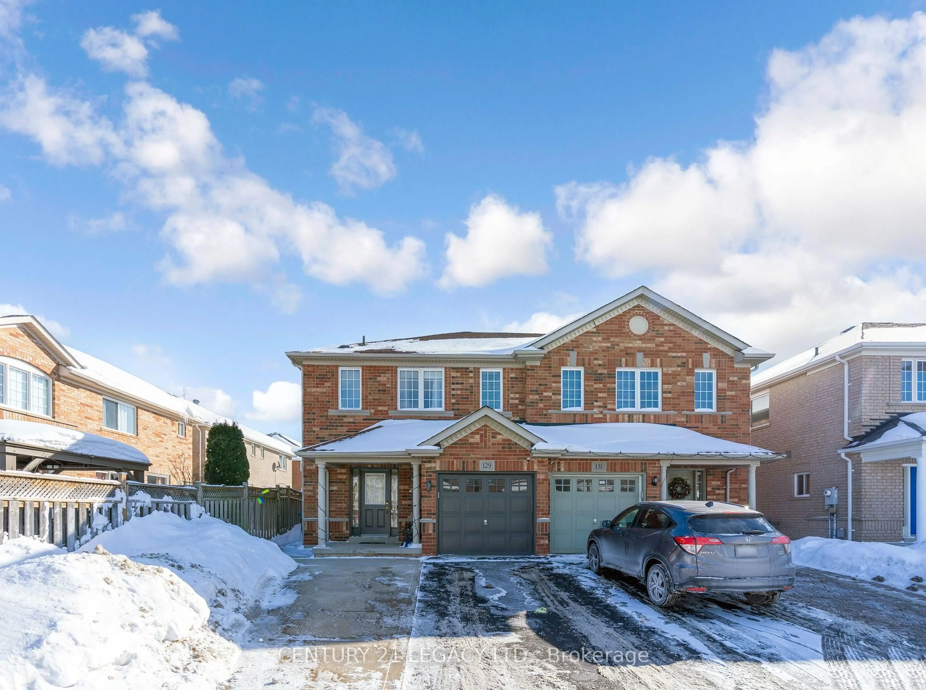 Home with brick exterior material, street for 129 Sugarhill Dr, Brampton Ontario L7A 3X4