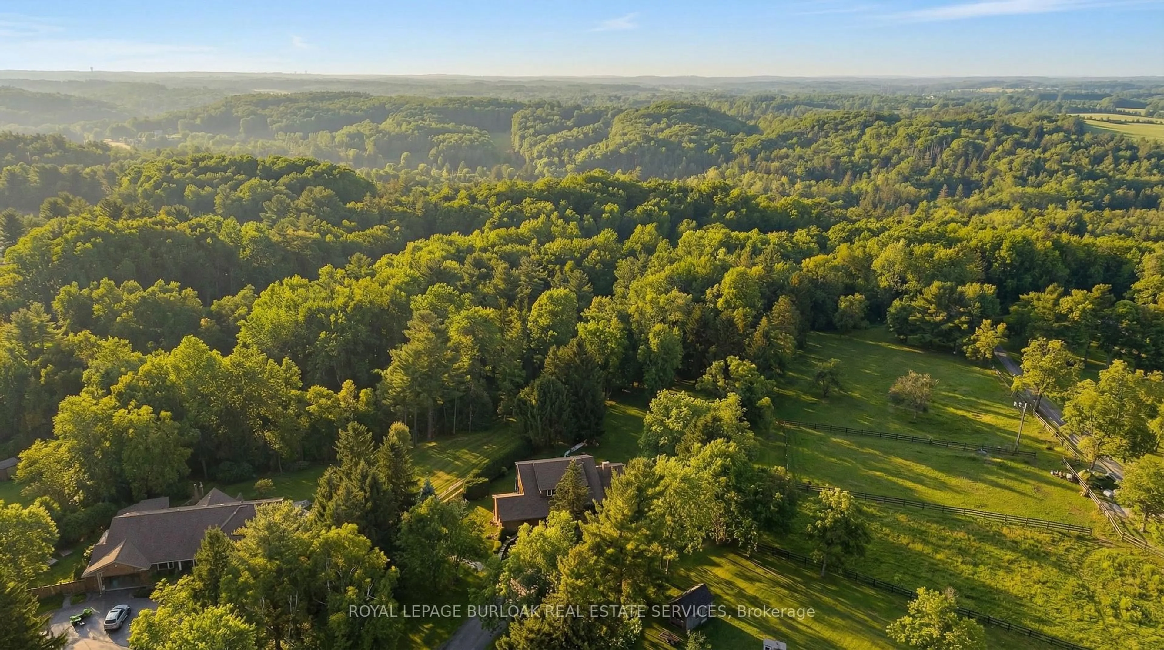 A pic from outside/outdoor area/front of a property/back of a property/a pic from drone, forest/trees view for 2431 Britannia Rd, Burlington Ontario L7P 0E9