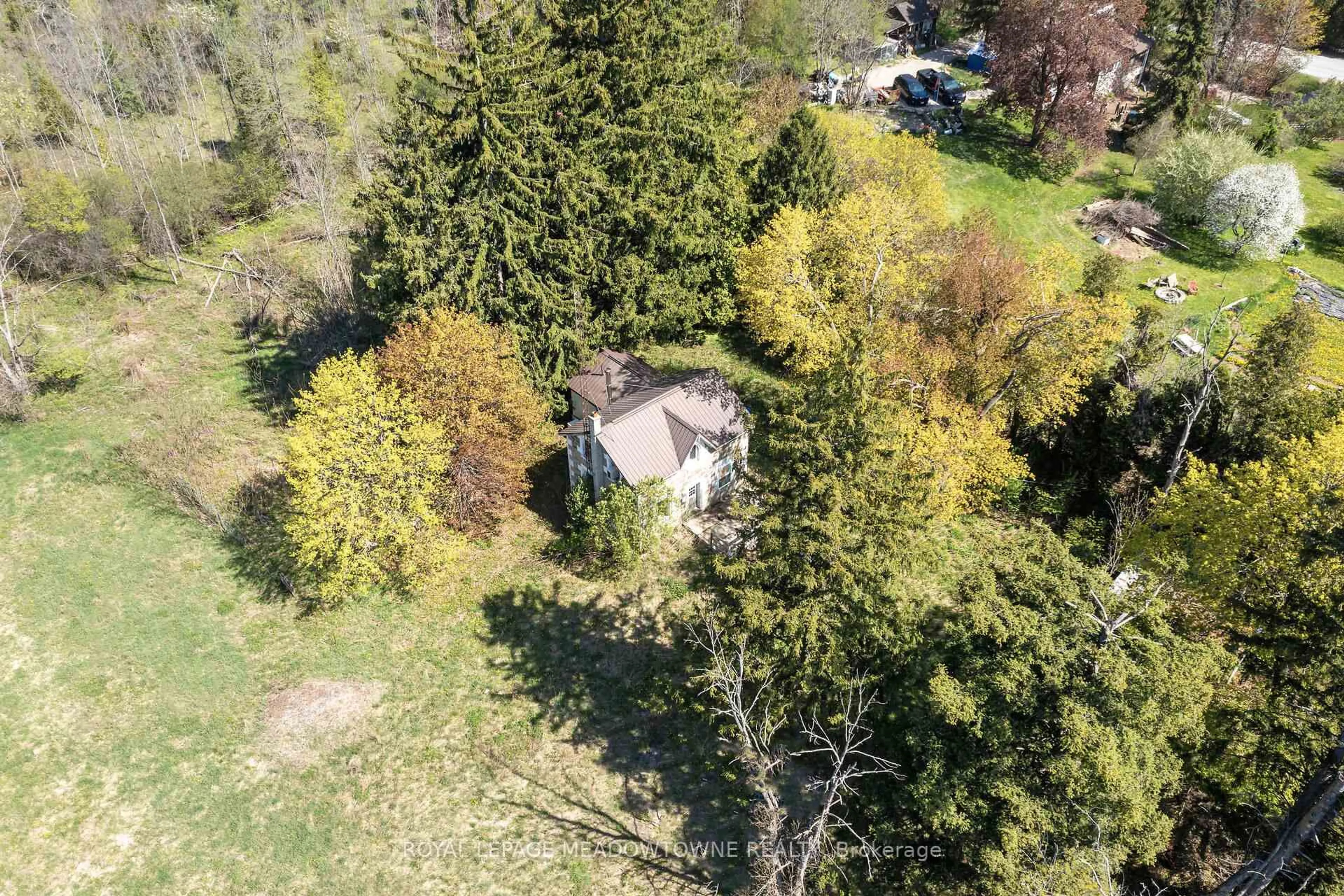 A pic from outside/outdoor area/front of a property/back of a property/a pic from drone, forest/trees view for 9414 First Line Nassagaweya, Milton Ontario L0P 1J0