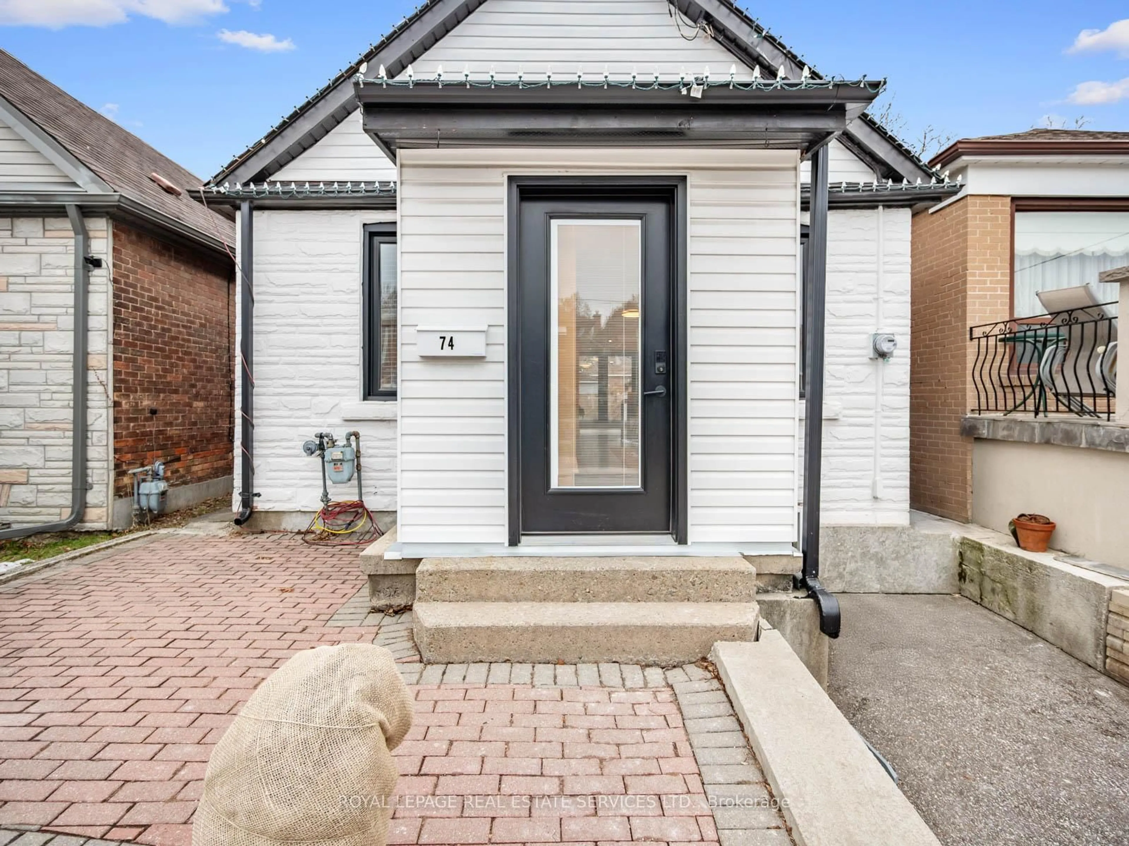 Home with brick exterior material, street for 74 Chryessa Ave, Toronto Ontario M6N 4T7