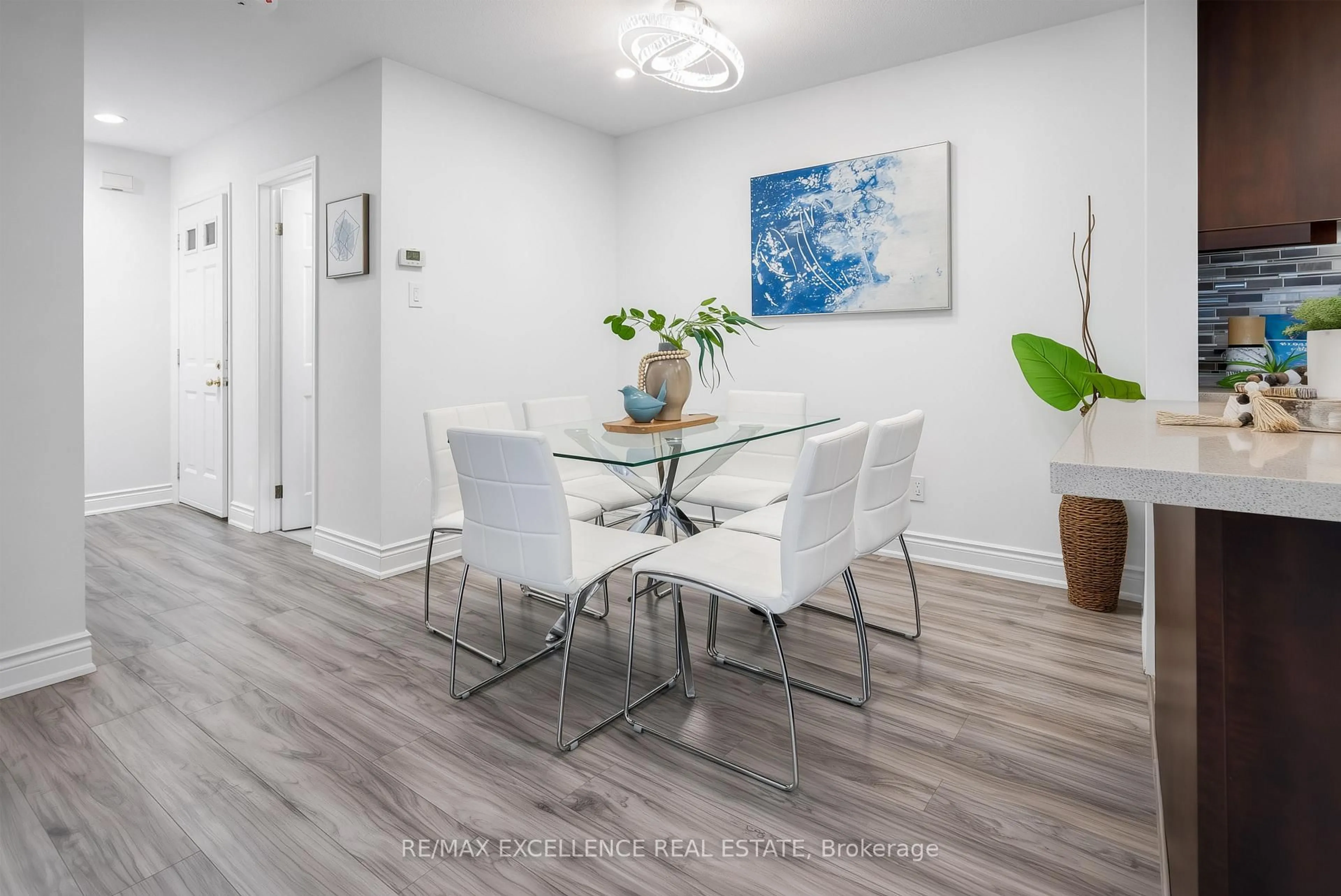 Dining room, wood/laminate floor for 24 Saint Tropez Crt, Brampton Ontario L6Y 4P9